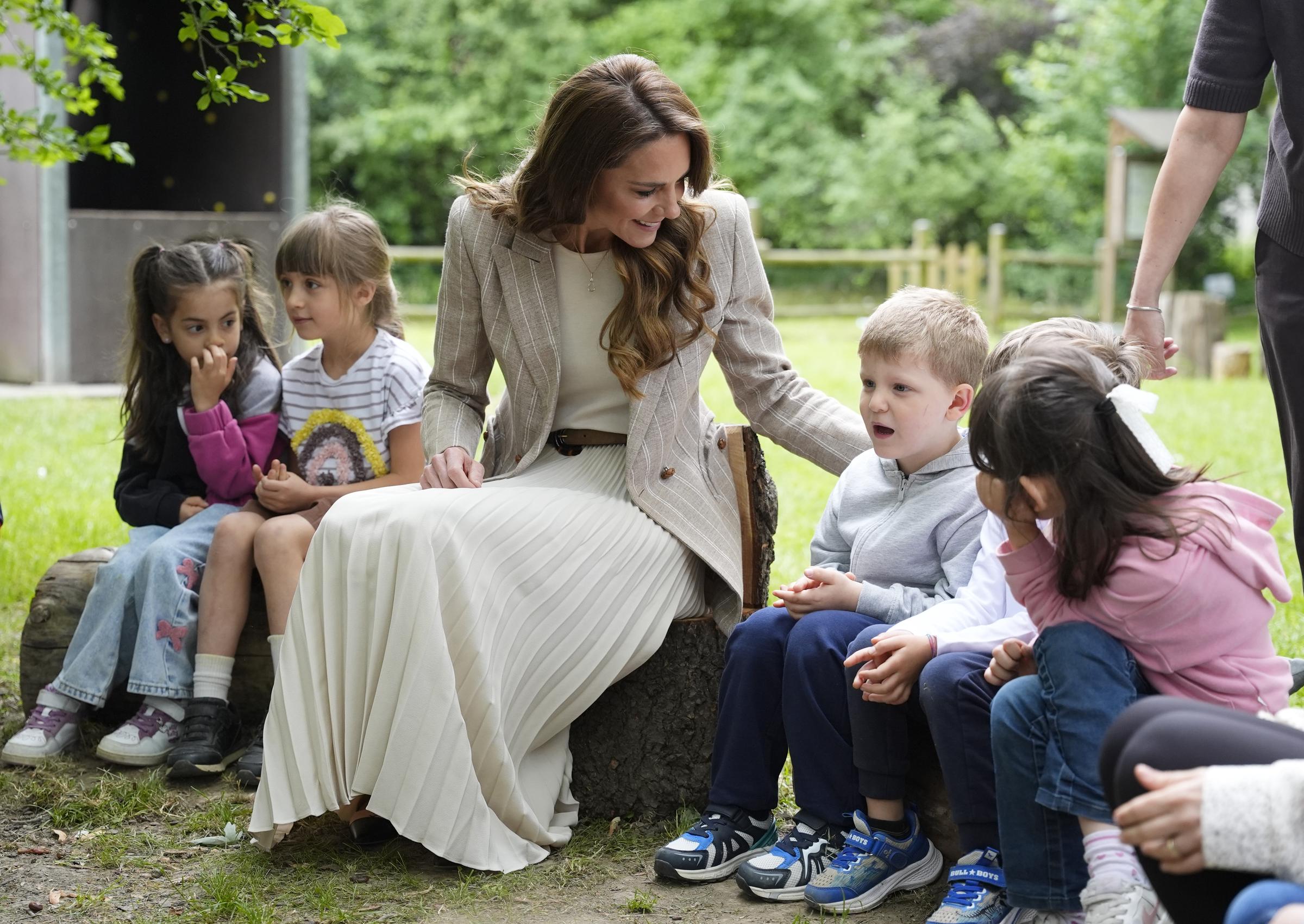 Catherine, Princess of Wales, speaks to children as she visits the Salvador Allende Scuola dell'infanzia to view education in nature during the second day of her visit to Reggio Emilia on May 14, 2026, in Reggio Emilia, Italy. | Source: Getty Images