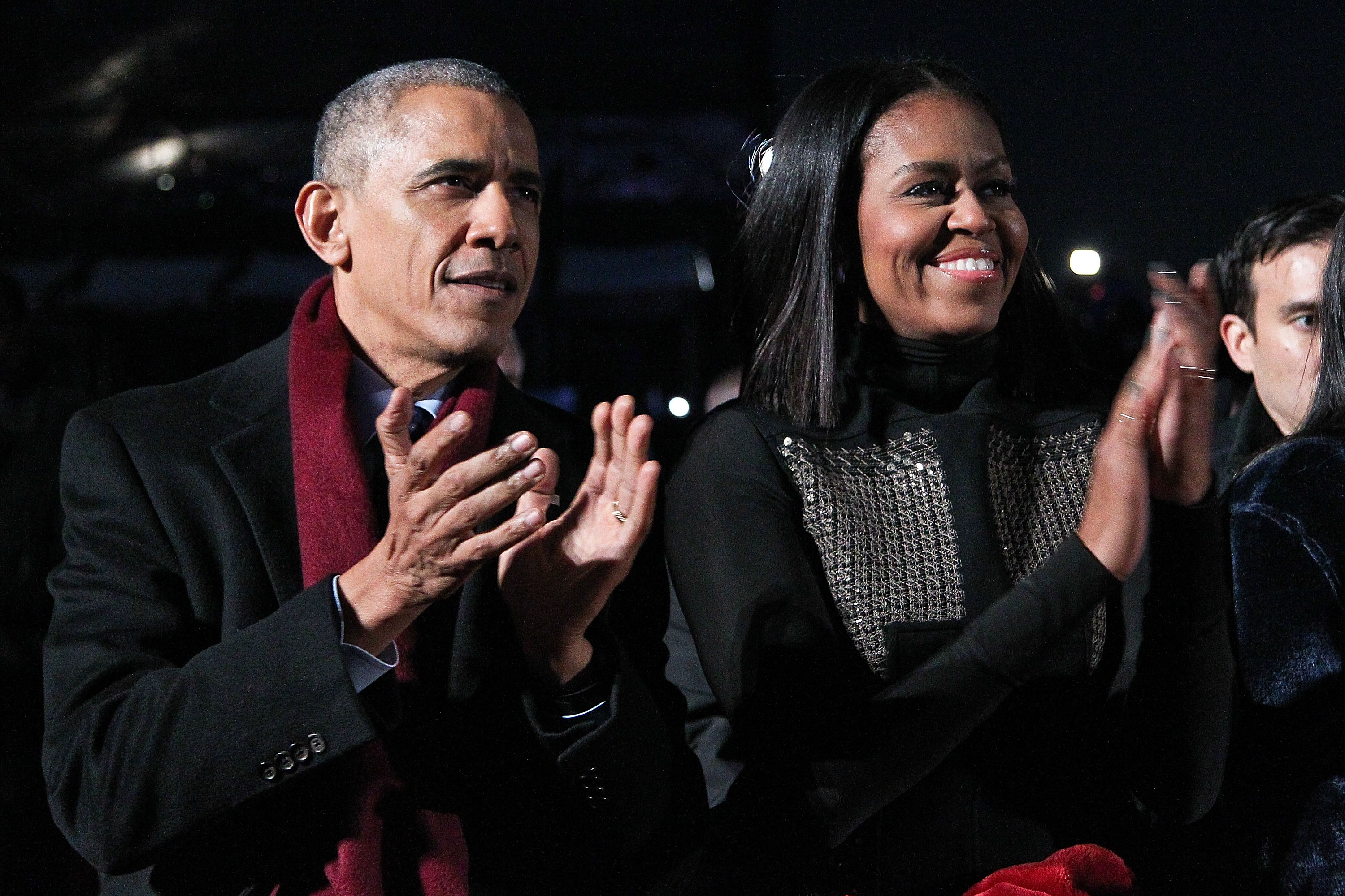President Barack Obama sits with first lady Michelle Obama to watch musical perfomances during the 94th Annual National Christmas Tree Lighting Ceremony on the Ellipse in PresidentÕs Park on December 1, 2016, in Washington, DC. | Source: Getty Images