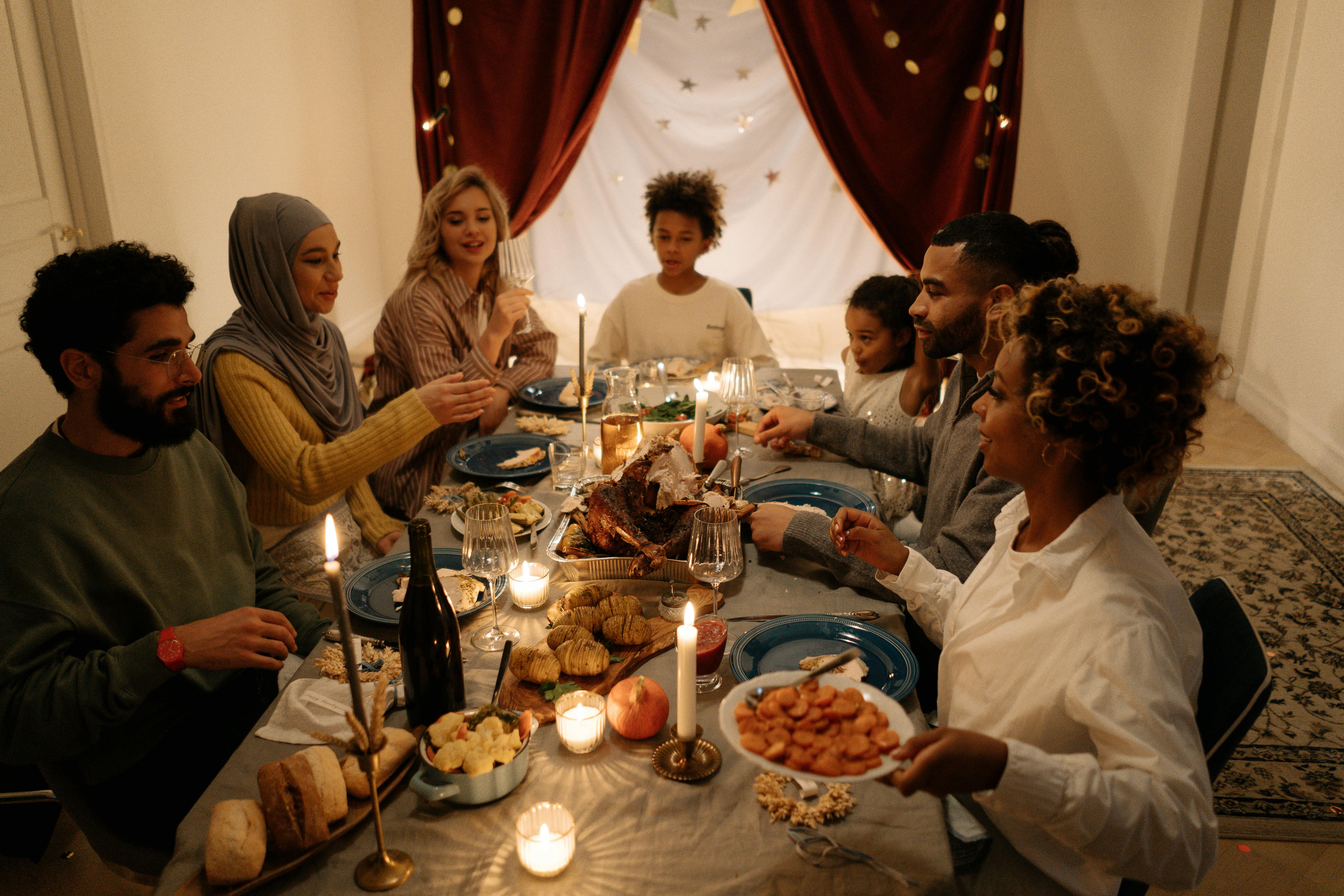 Happy people having dinner | Source: Pexels
