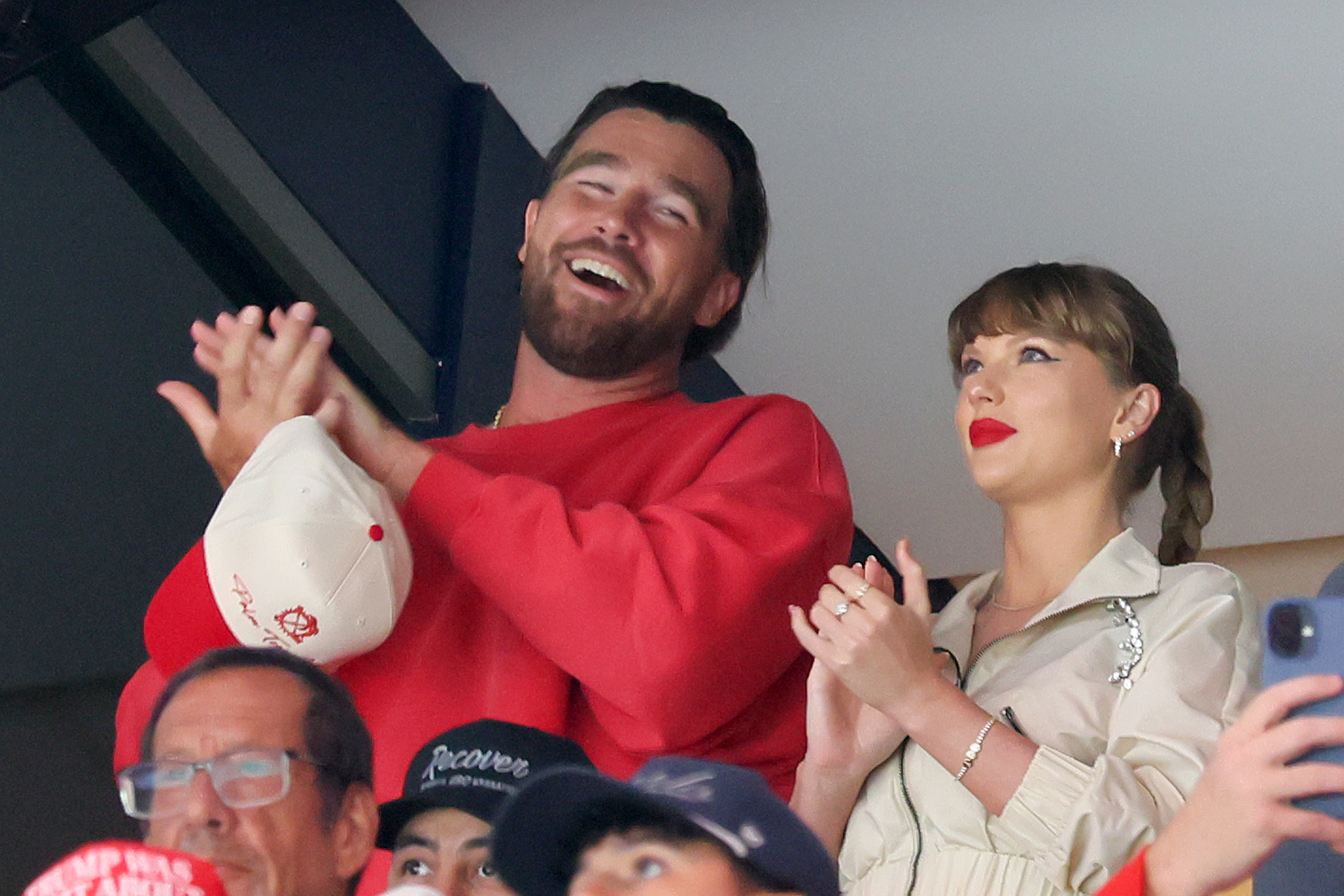 Travis Kelce, left, and Taylor Swift react as the Edmonton Oilers and the Florida Panthers play during the first period in Game Four of the 2025 Stanley Cup Final at Amerant Bank Arena on June 12, 2025 in Sunrise, Florida | Source: Getty Images
