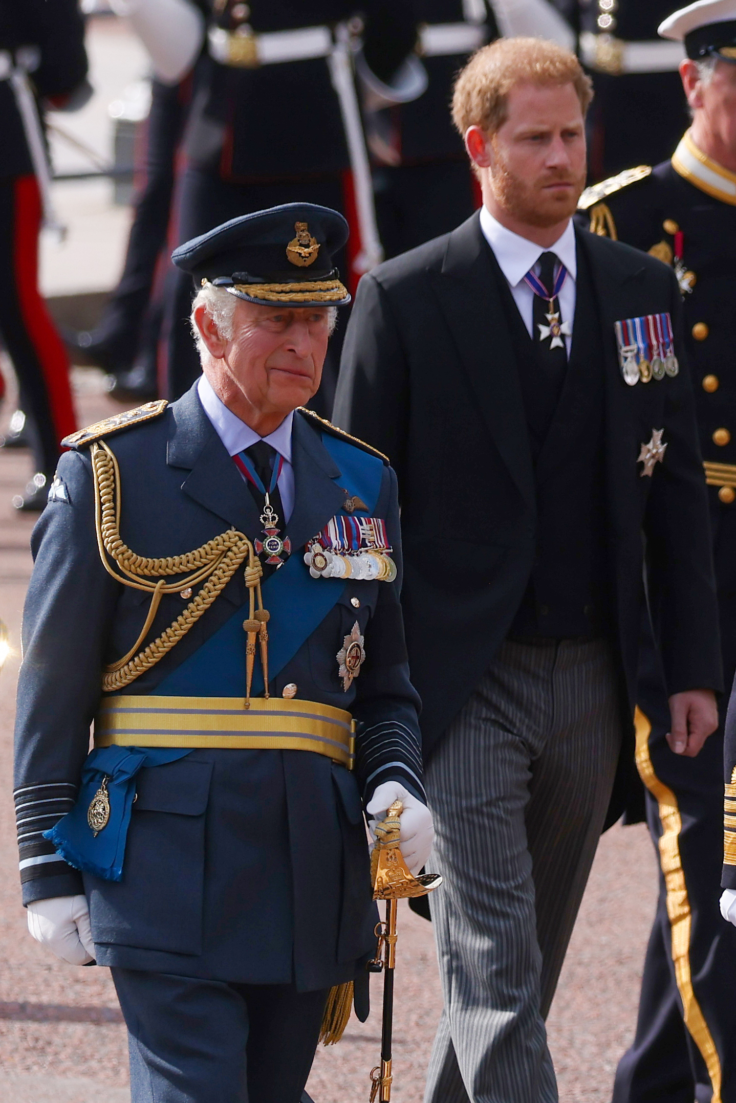 King Charles III and Prince Harry follow the cortege carrying the coffin of Queen Elizabeth II to Westminster Hall on September 14, 2022, in London, England. | Source: Getty Images