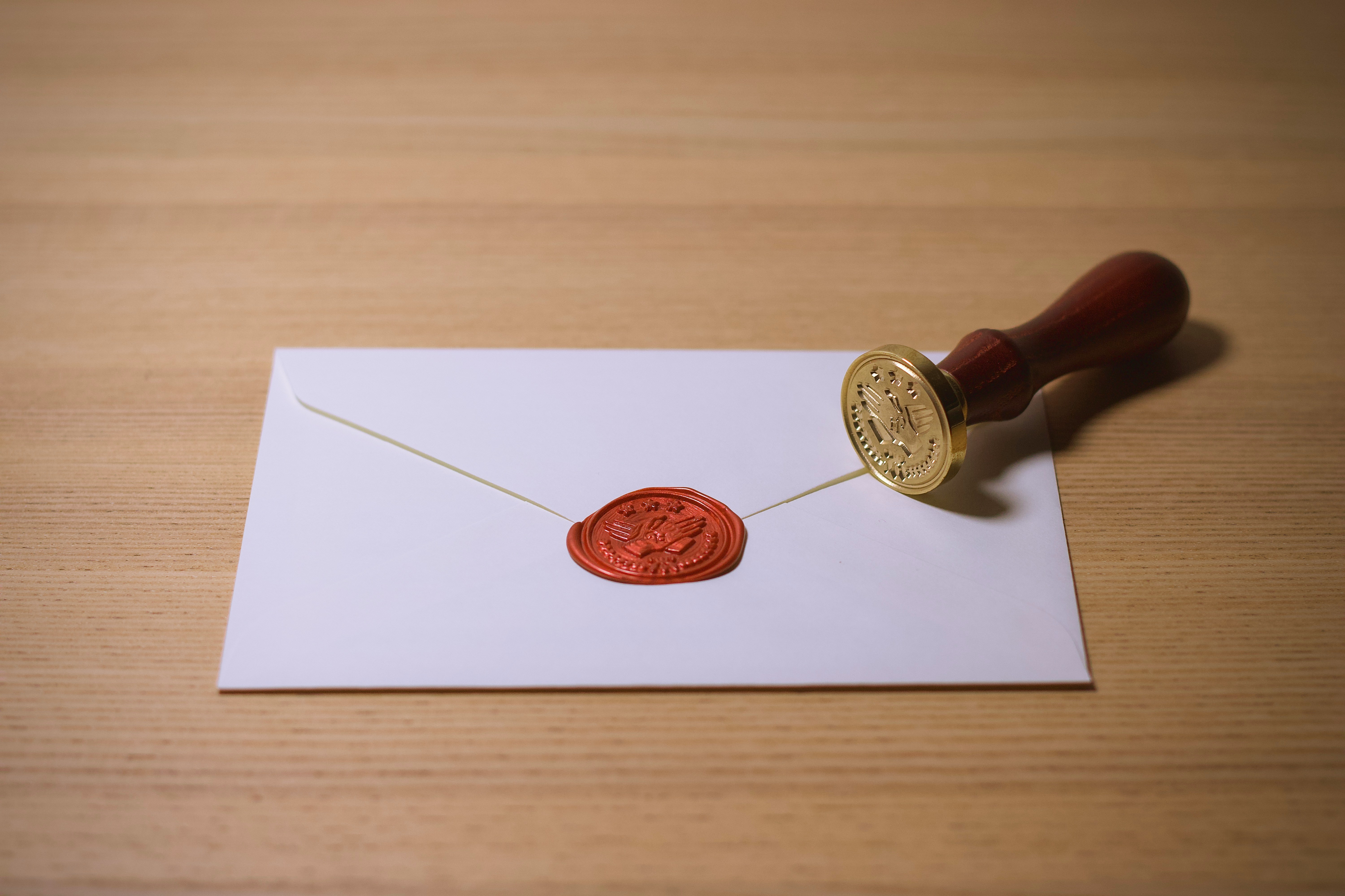 An envelope with a wax seal | Source: Unsplash