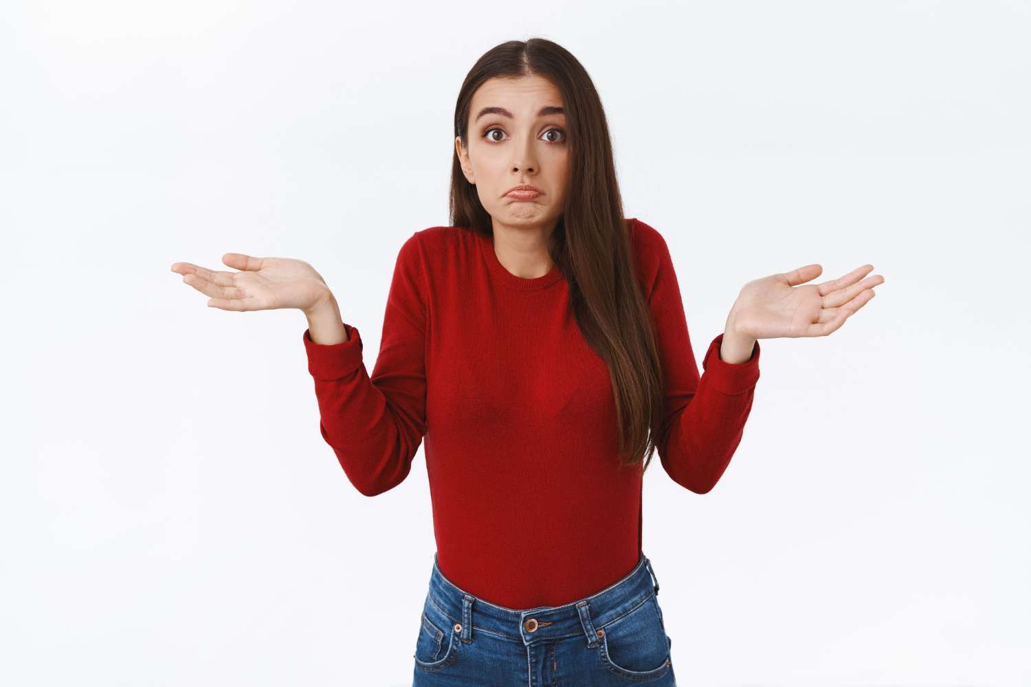 A woman shrugging | Source: Freepik
