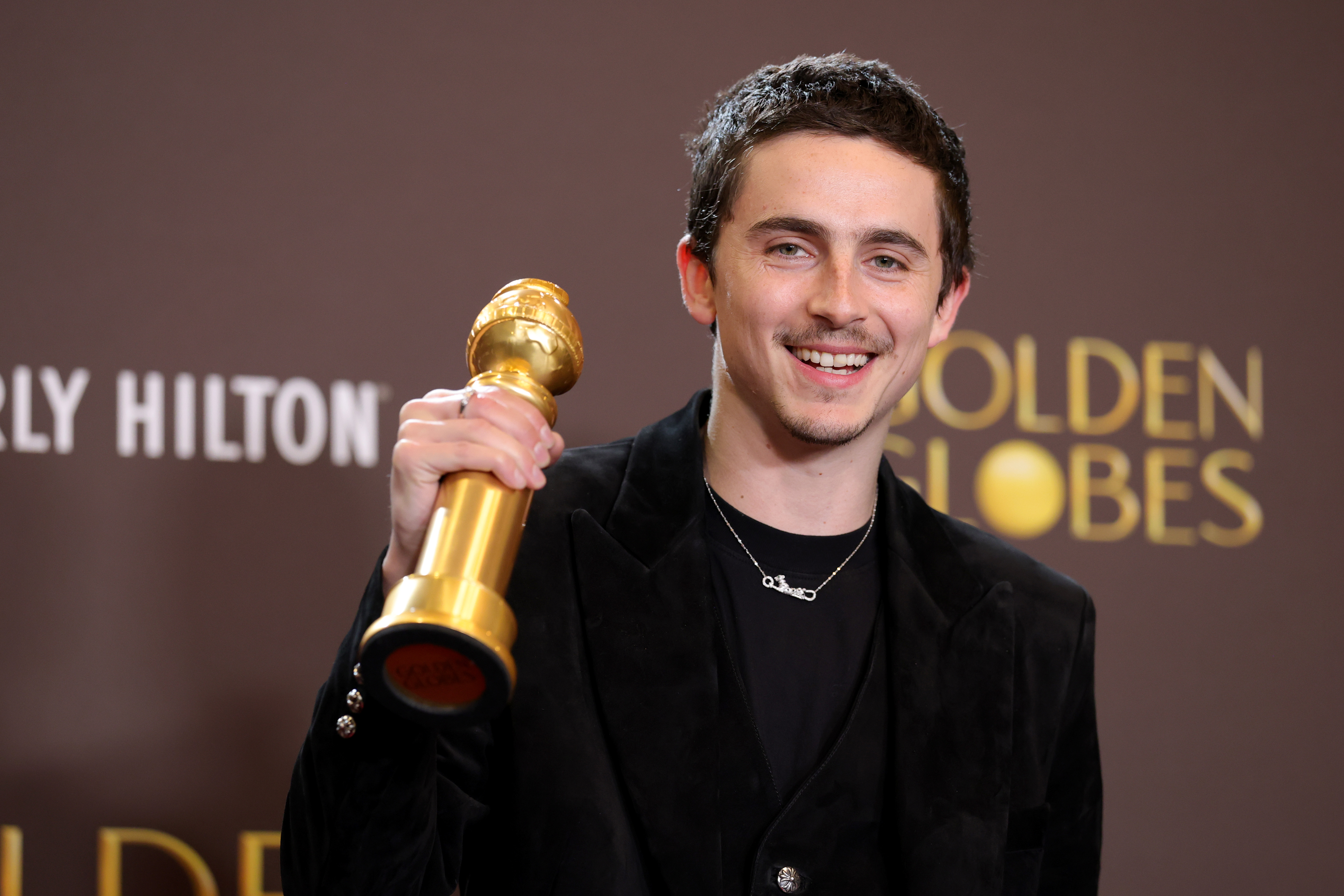 Timothée Chalamet, winner of the Best Performance by a Male Actor in a Motion Picture – Musical or Comedy award for "Marty Supreme," poses in the press room during the 83rd annual Golden Globe Awards at The Beverly Hilton on January 11, 2026 in Beverly Hills, California. | Source: Getty Images