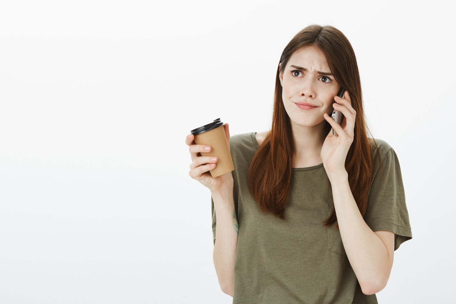 An annoyed woman talking on the phone | Source: Freepik