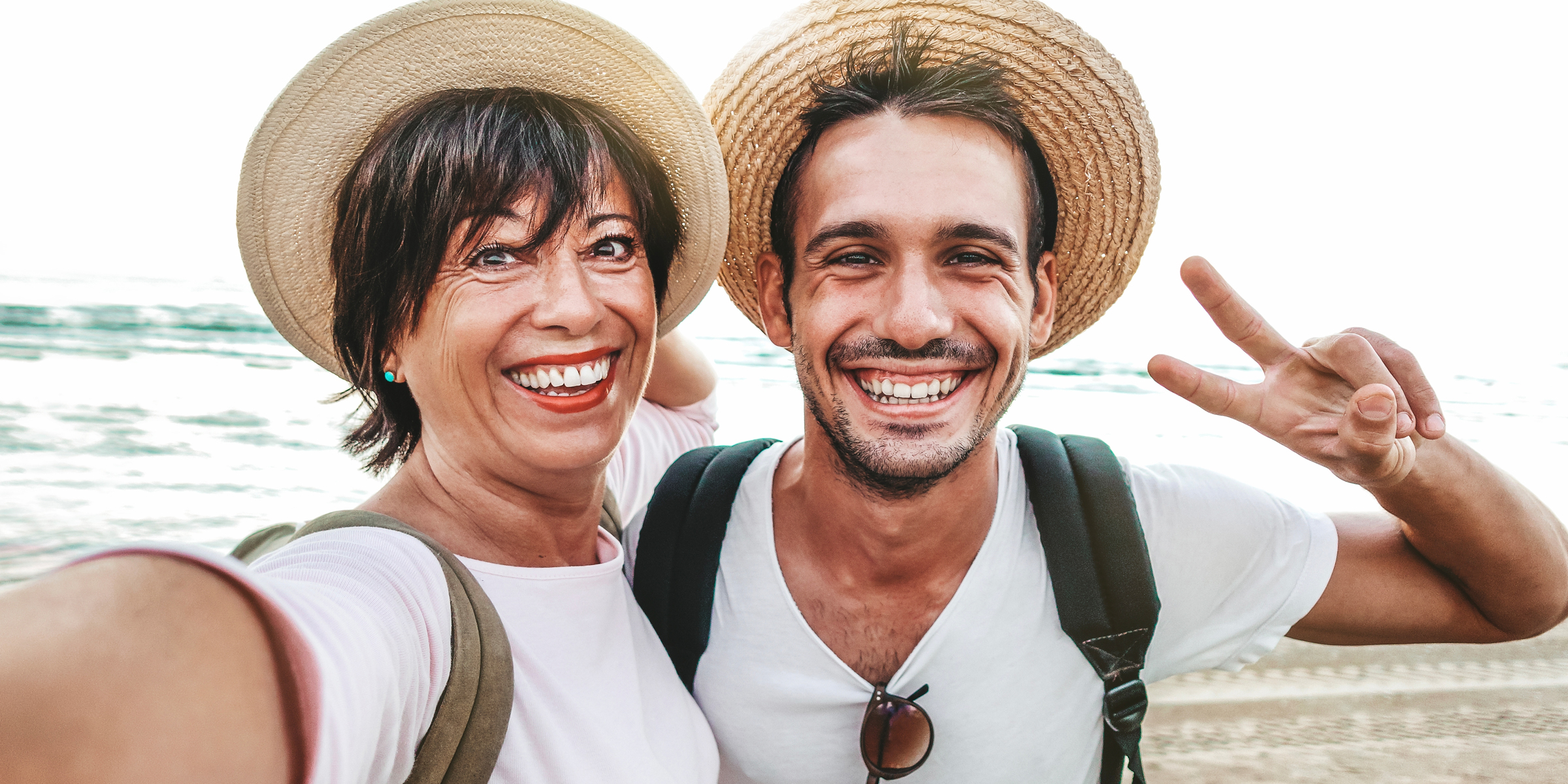 A mother-son duo click a selfie during their vacation | Source: Shutterstock