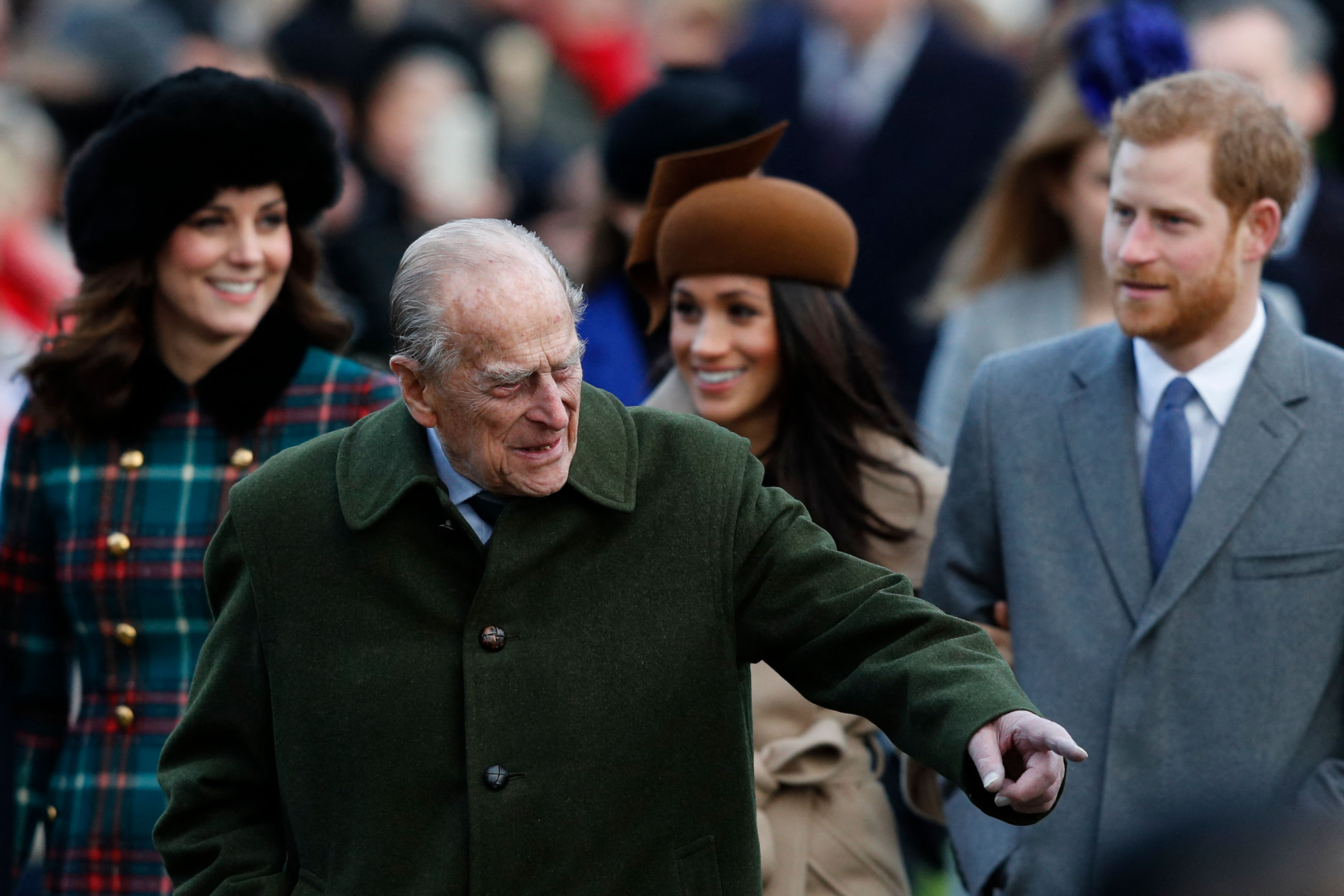 Prince Philip, Duke of Edinburgh with Catherine, Duchess of Cambridge, Meghan Markle and Prince Harry at St Mary Magdalene Church in Sandringham, Norfolk, eastern England, on December 25, 2017. | Source: Getty Images