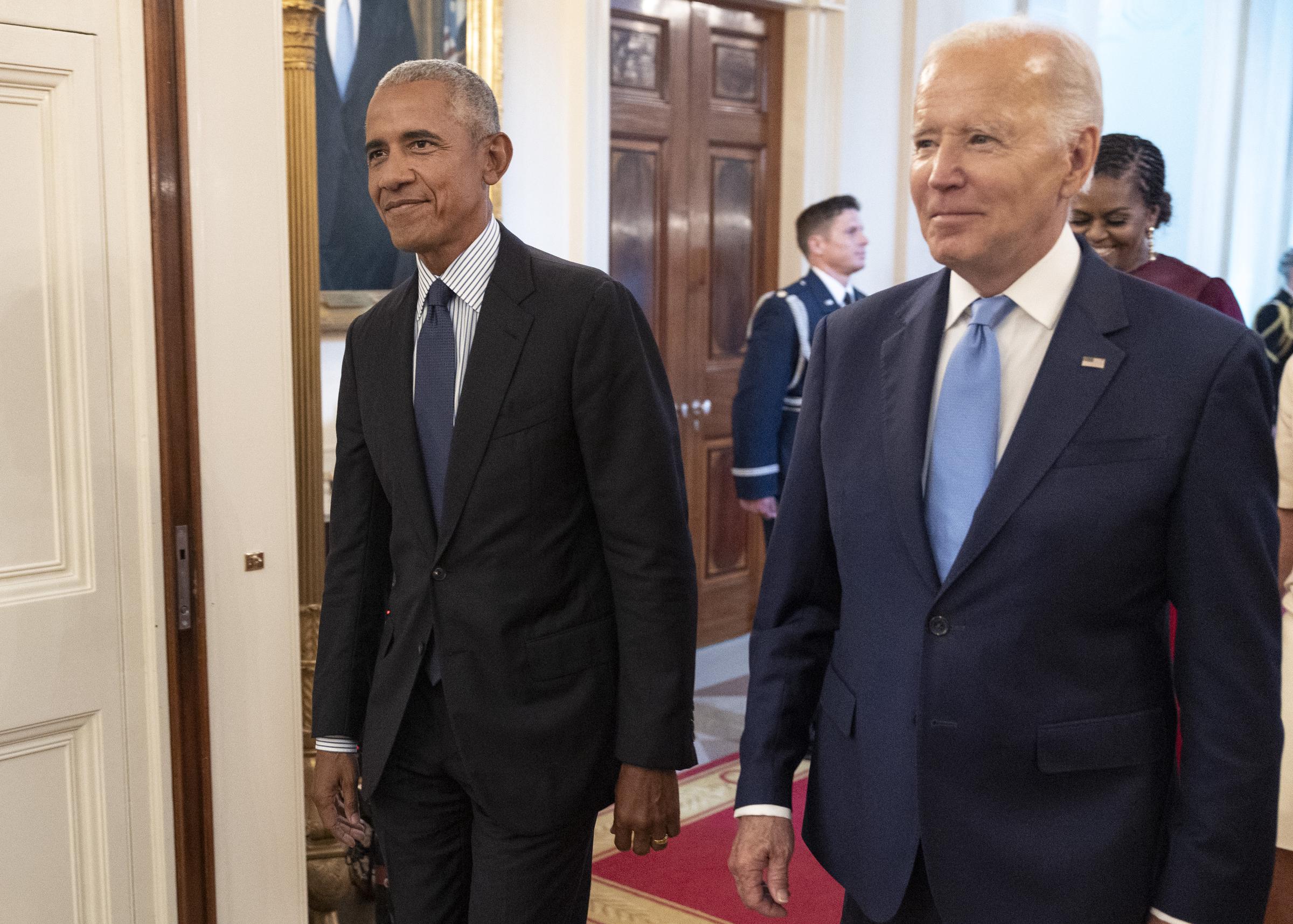 Barack Obama and Joe Biden arrive at a ceremony to unveil the official Obama White House portraits at the White House on September 7, 2022, in Washington, DC. | Source: Getty Images