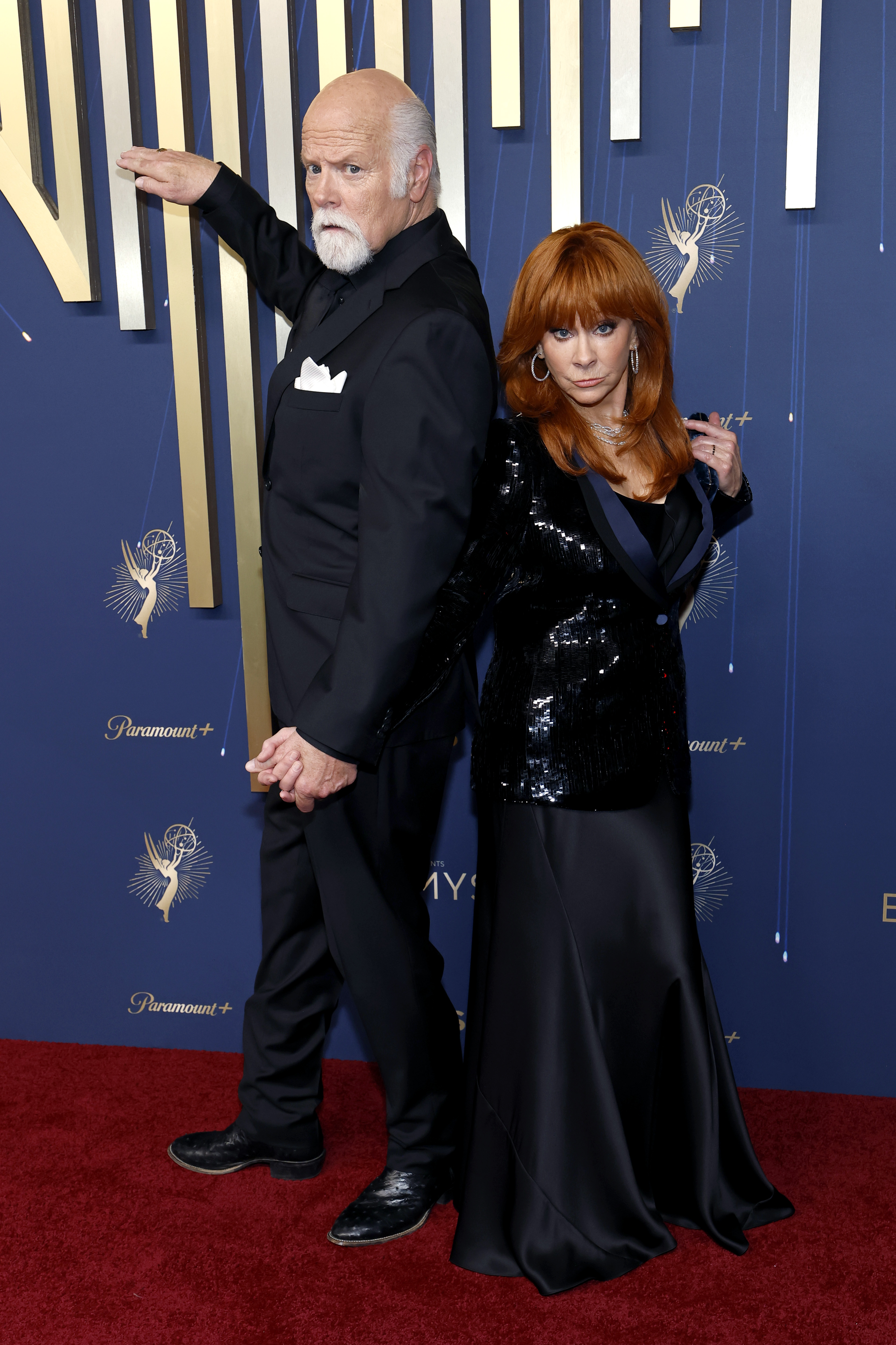 Rex Linn and Reba McEntire attend the 77th Primetime Emmy Awards at Peacock Theater on September 14, 2025, in Los Angeles, California. | Source: Getty Images
