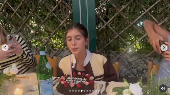 Penelope Disick pictured blowing a candle on her birthday, dated July 2025 | Source: Instagram/kourtneykardash