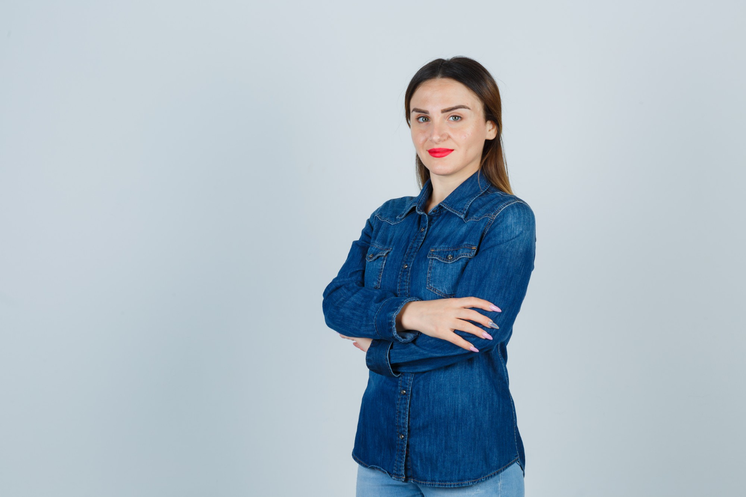 A woman with her arms crossed | Source: Freepik