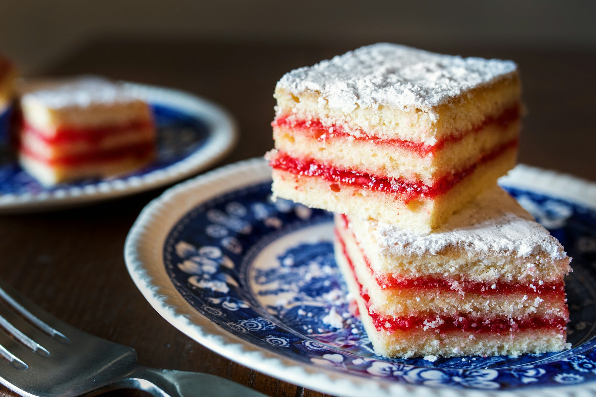 My Sister Made Me Eat in the Garage at Her Wedding Because 'There Wasn't Enough Space for Everyone Inside' 19 Slices of sheet cake on two plates | Source: Unsplash