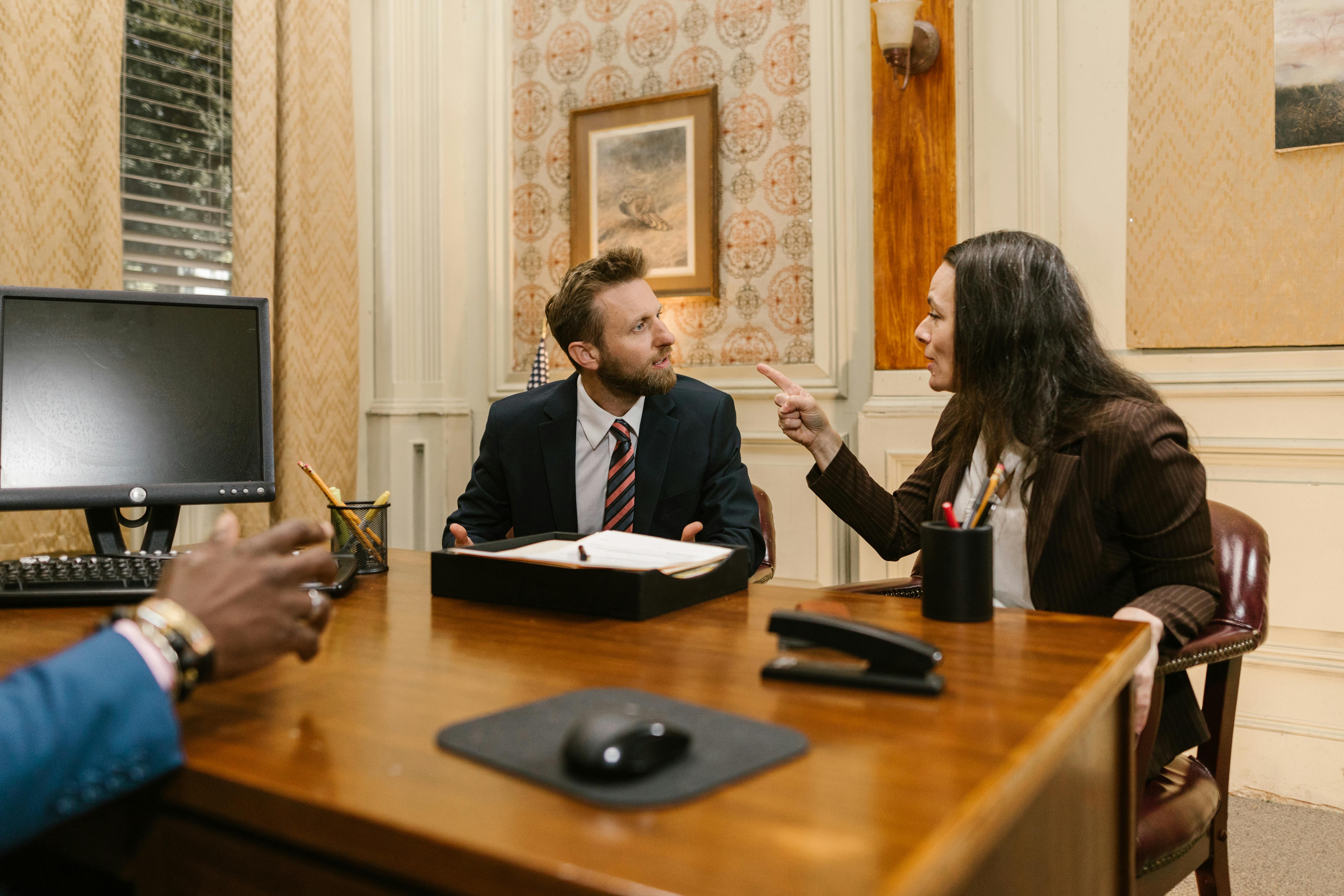 People having a meeting in an office | Source: Pexels