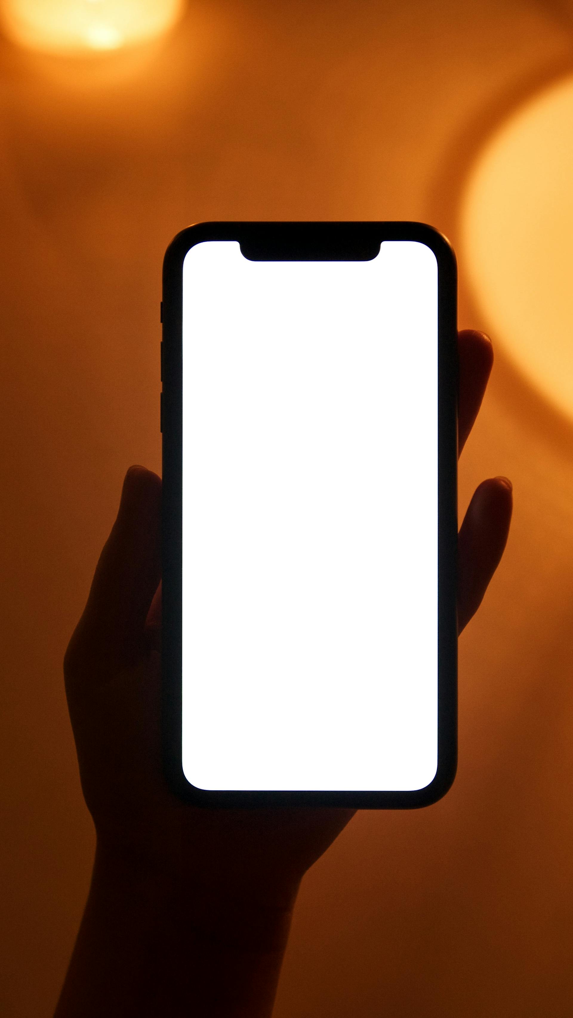 A person holding a cell phone | Source: Pexels