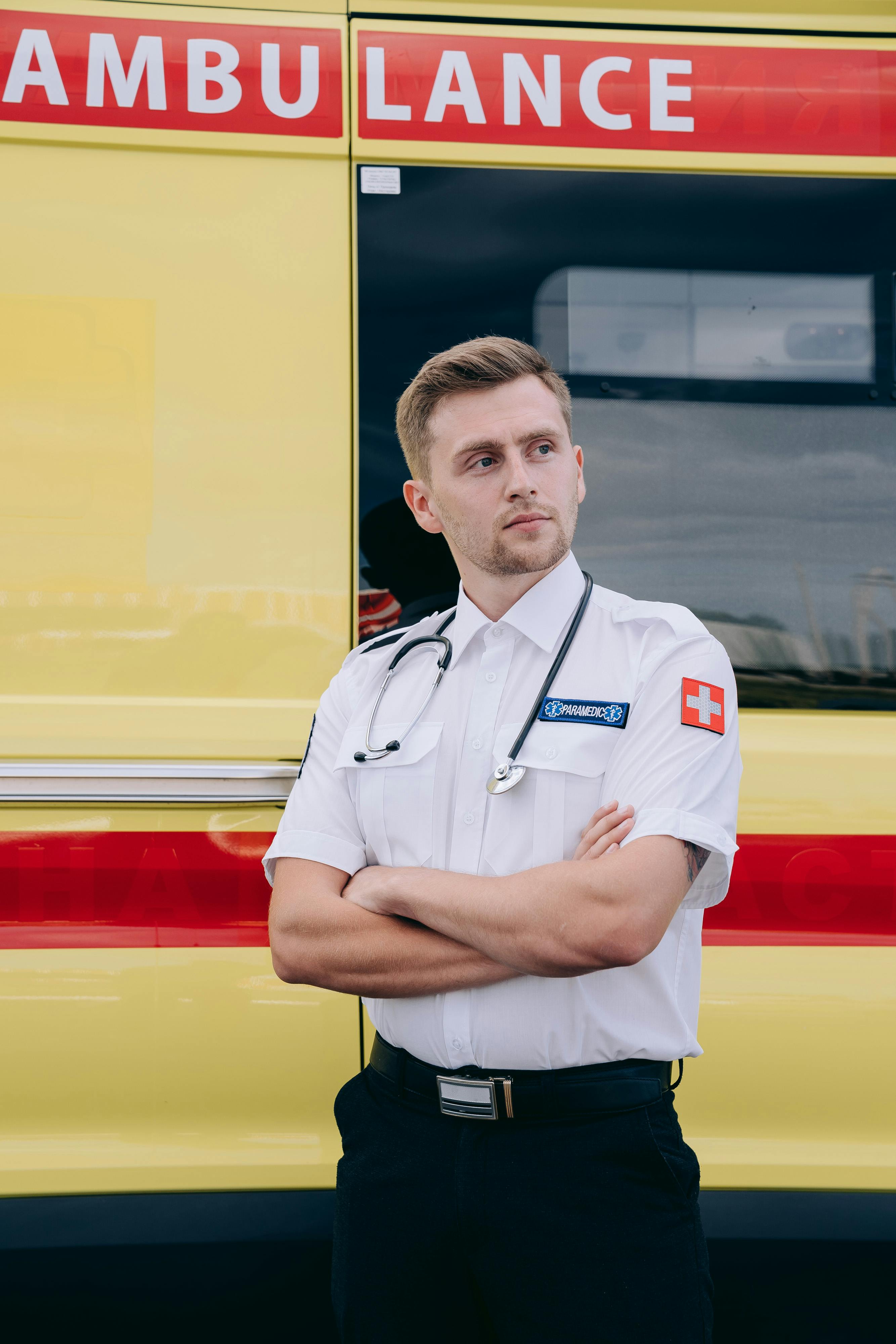 A paramedic standing with folded arms | Source: Pexels