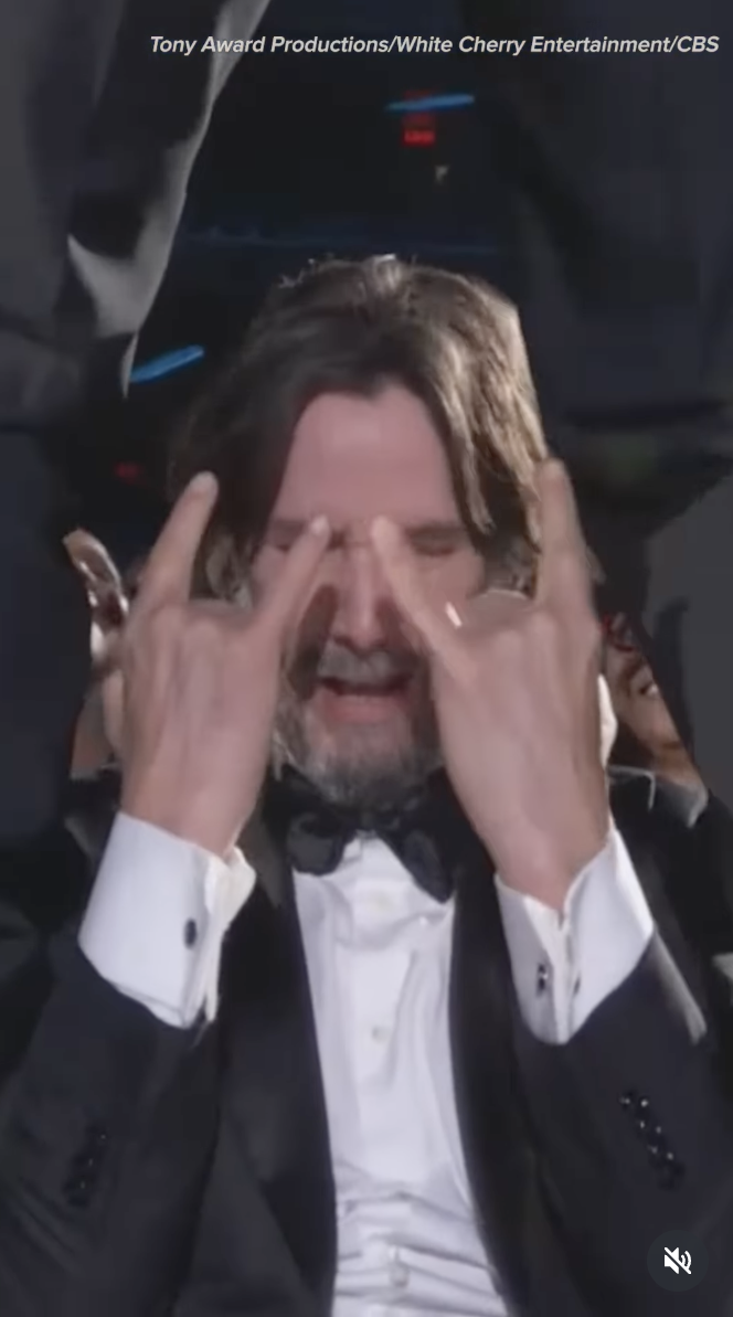 Keanu Reeves poses during Jonathan Groff's performance at the Tony Awards on June 8, 2025 | Source: Instagram/enews