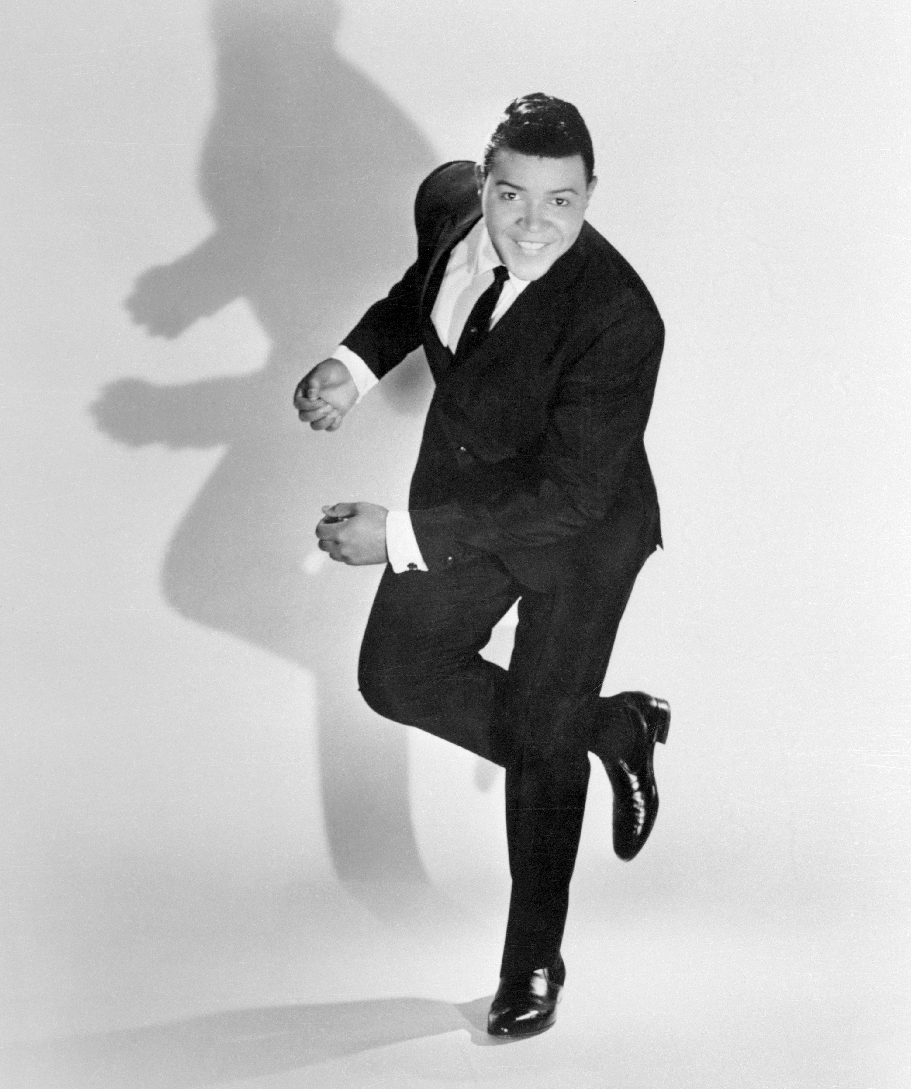 Chubby Checker is pictured dancing circa 1961. | Source: Getty Images