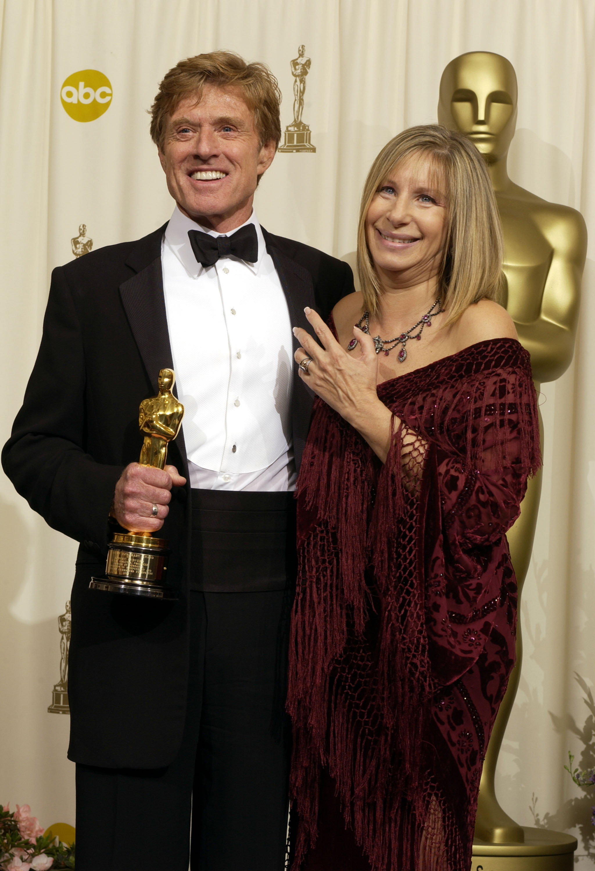 Robert Redford and Barbra Streisand pose in the press room during The 74th Annual Academy Awards at Kodak Theater on March 24, 2002, in Hollywood, California. | Source: Getty Images