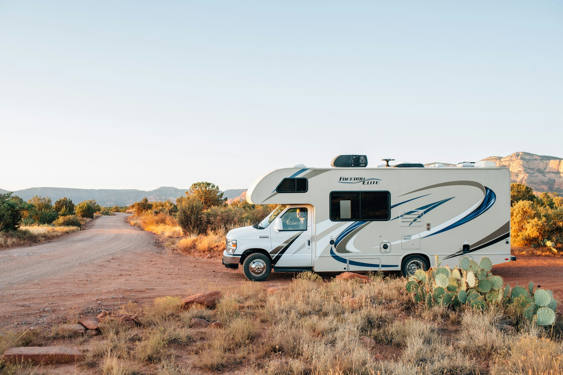 An RV on a badly maintained road | Source: Unsplash