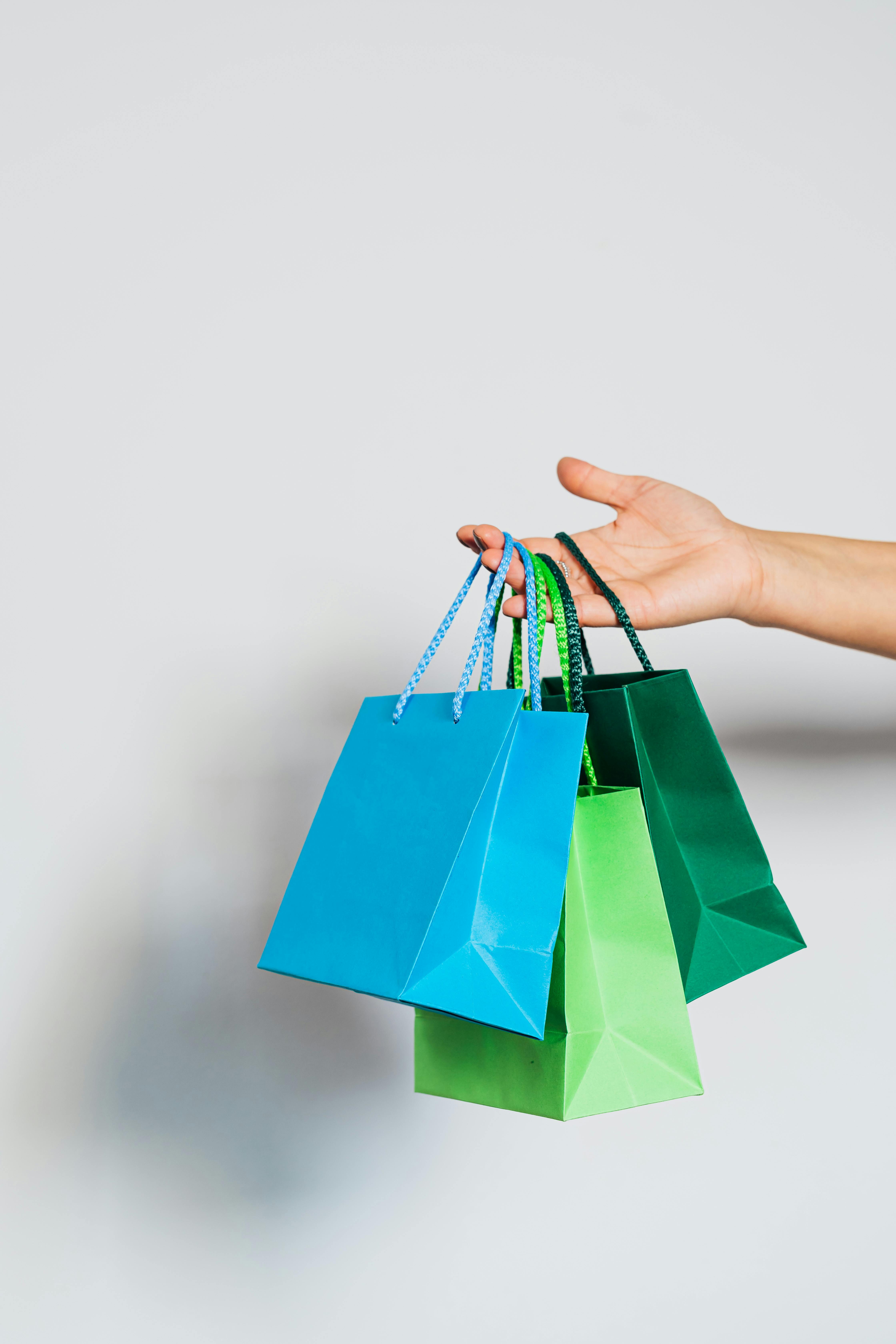 A person holding giftbags | Source: Pexels
