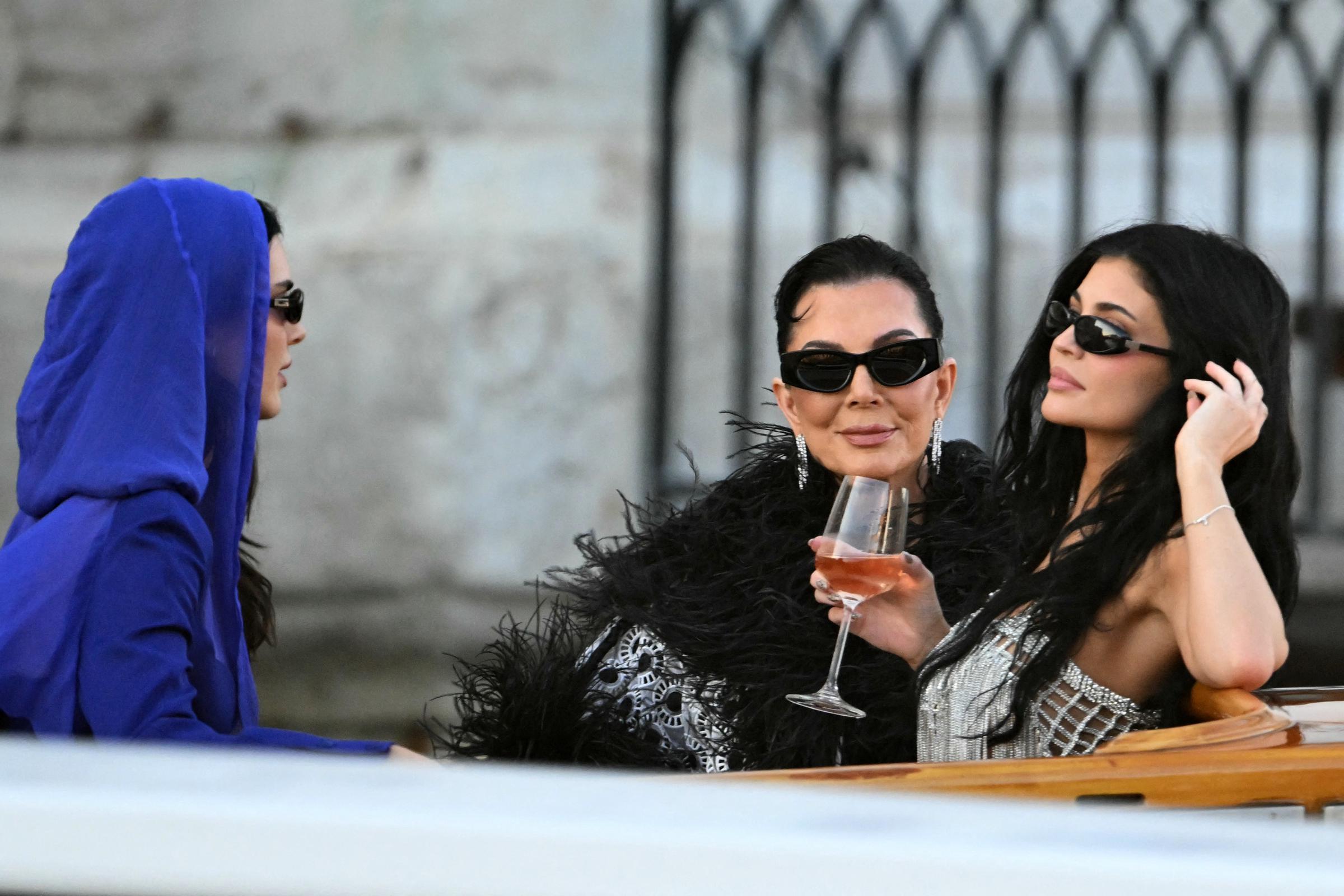 Kendall Jenner, Kris Jenner, and Kylie Jenner leave the Gritti Palace Hotel for a party on the third day of the wedding of Jeff Bezos with Lauren Sanchez, in Venice on June 28, 2025 | Source: Getty Images