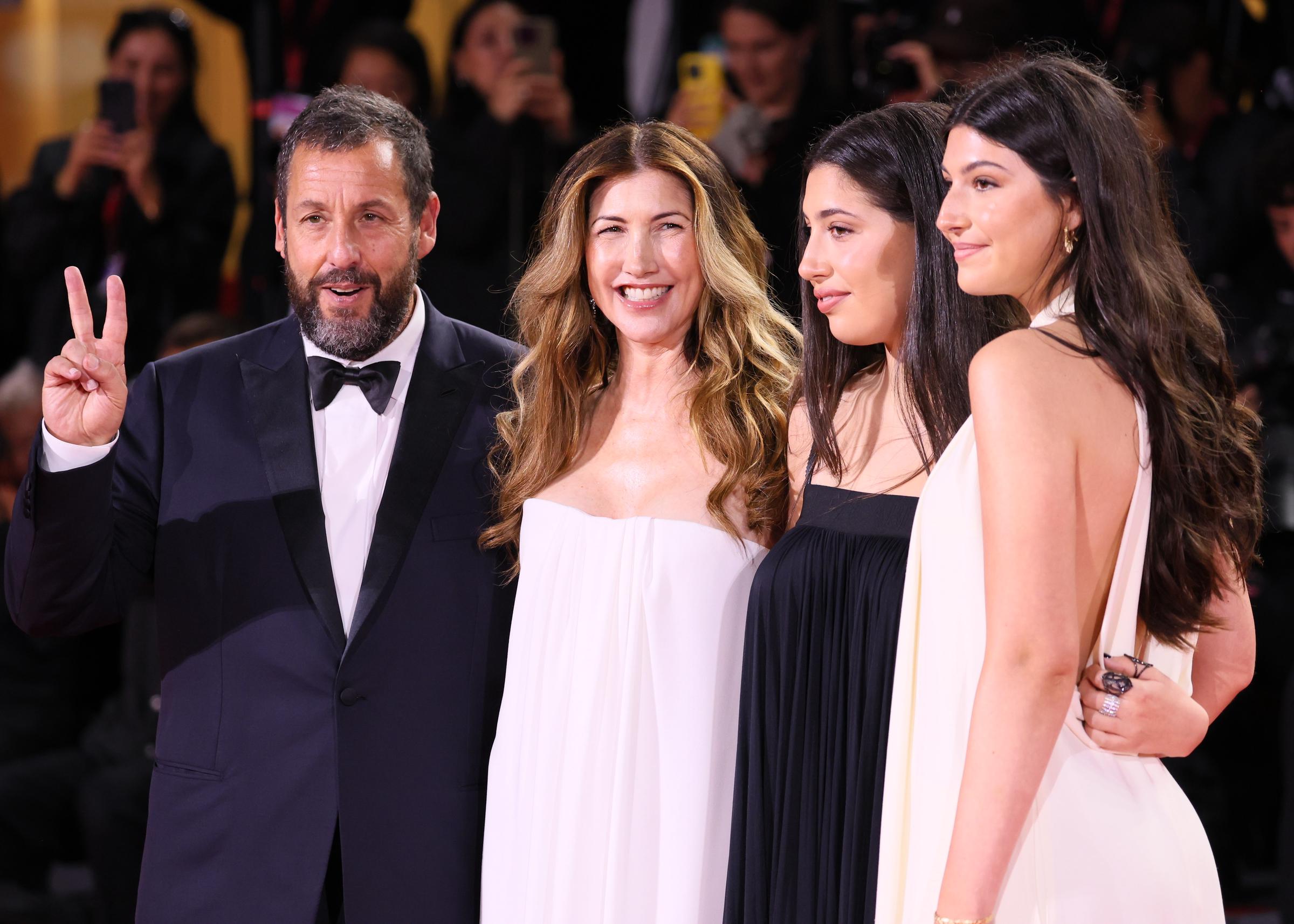 Adam Sandler, Jackie Sandler, Sadie Madison Sandler and Sunny Madeline Sandler attend the "Jay Kelly" red carpet during the 82nd Venice International Film Festival on August 28, 2025, in Venice, Italy. | Source: Getty Images