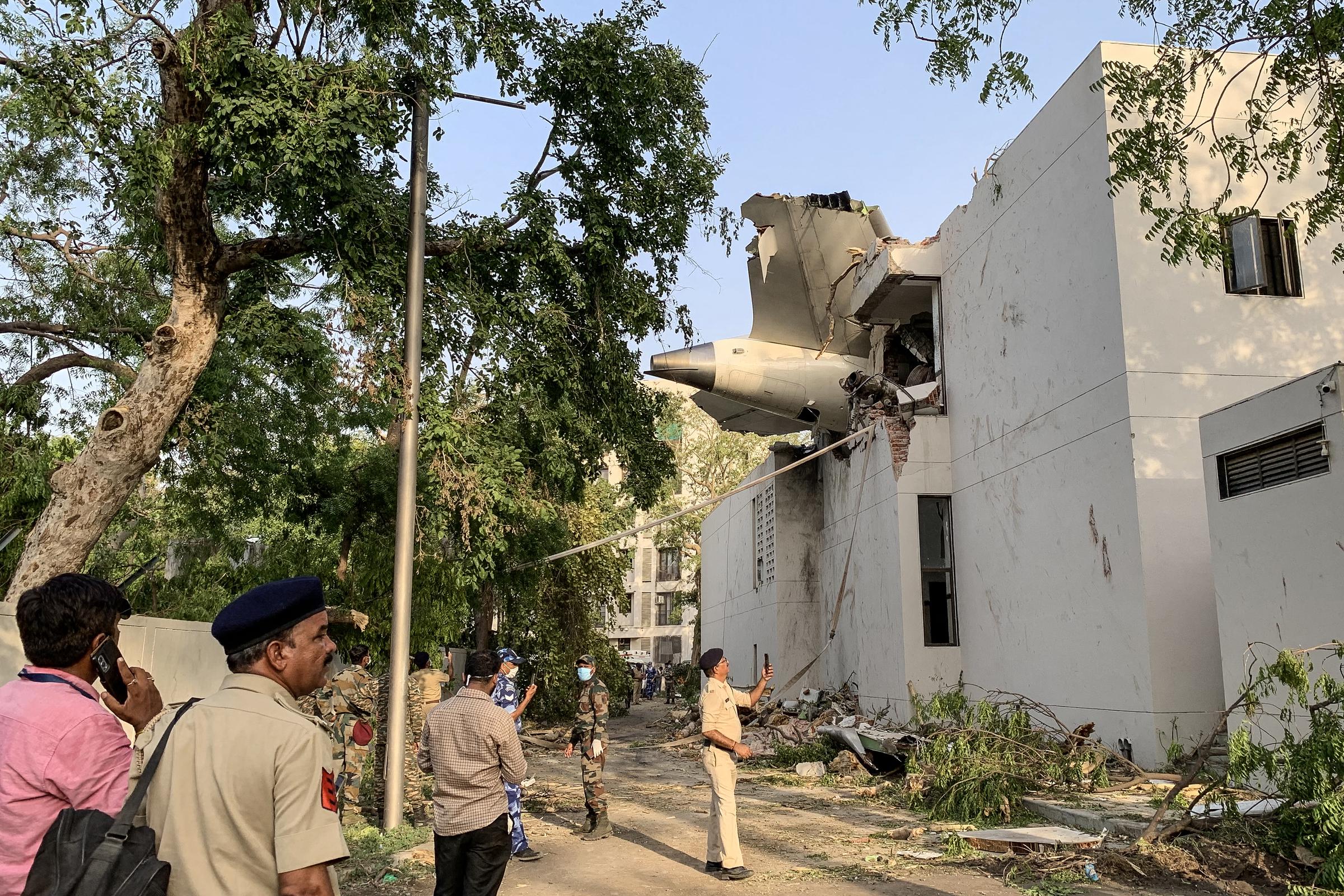 The back of Air India flight 171 is pictured at the site after it crashed in a residential area near the airport in Ahmedabad on June 12, 2025. | Source: Getty Images