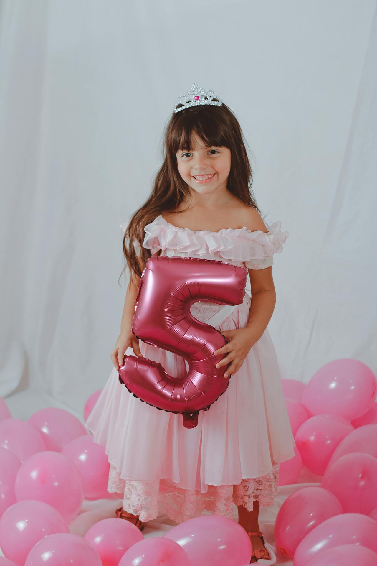 A delighted little girl celebrating her 5th birthday | Source: Pexels