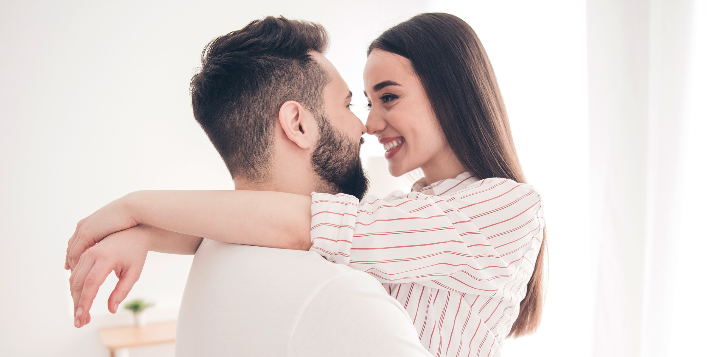Couple sharing an intimate moment | Source: Shutterstock