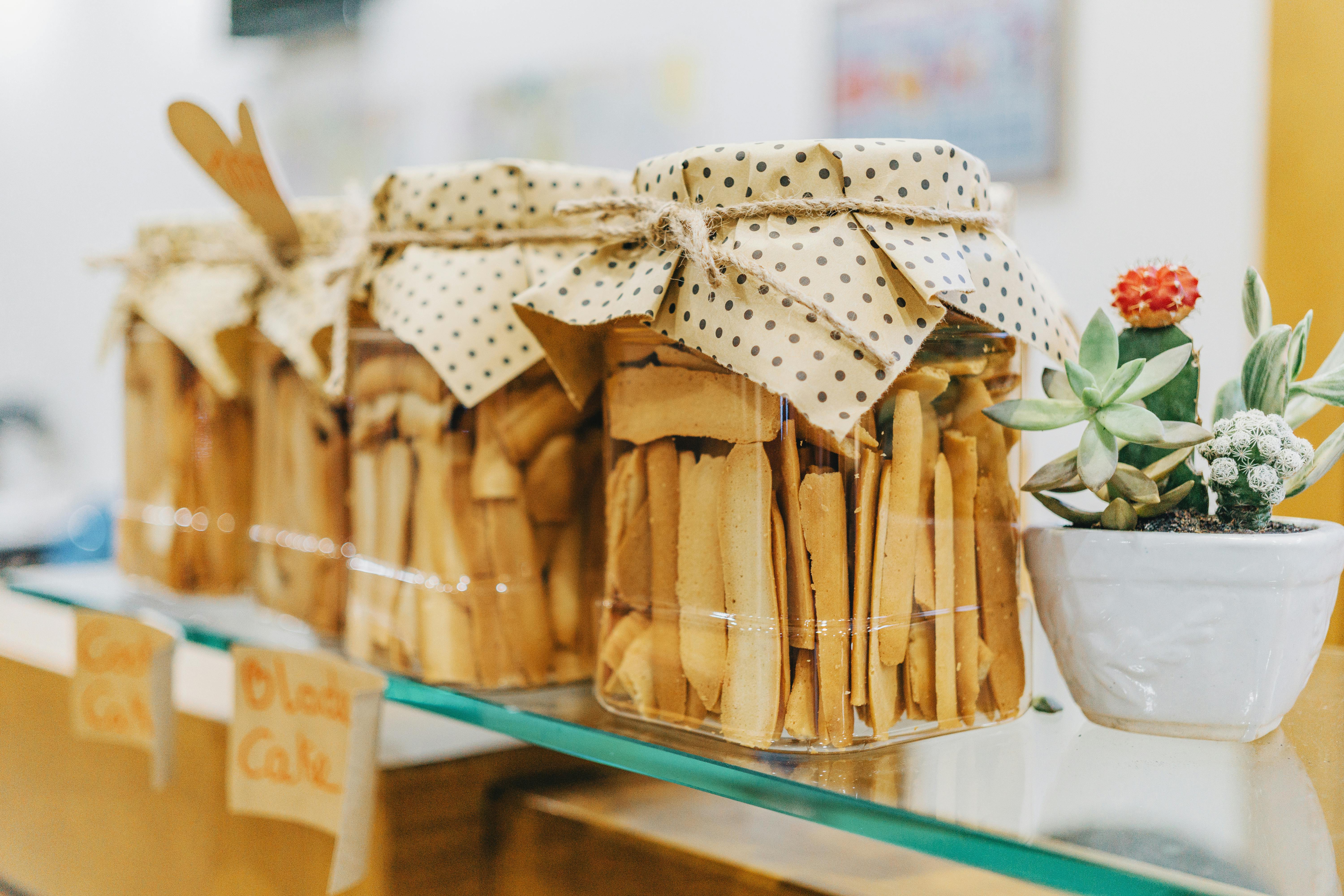 Jars of biscuits on a counter | Source: Pexels