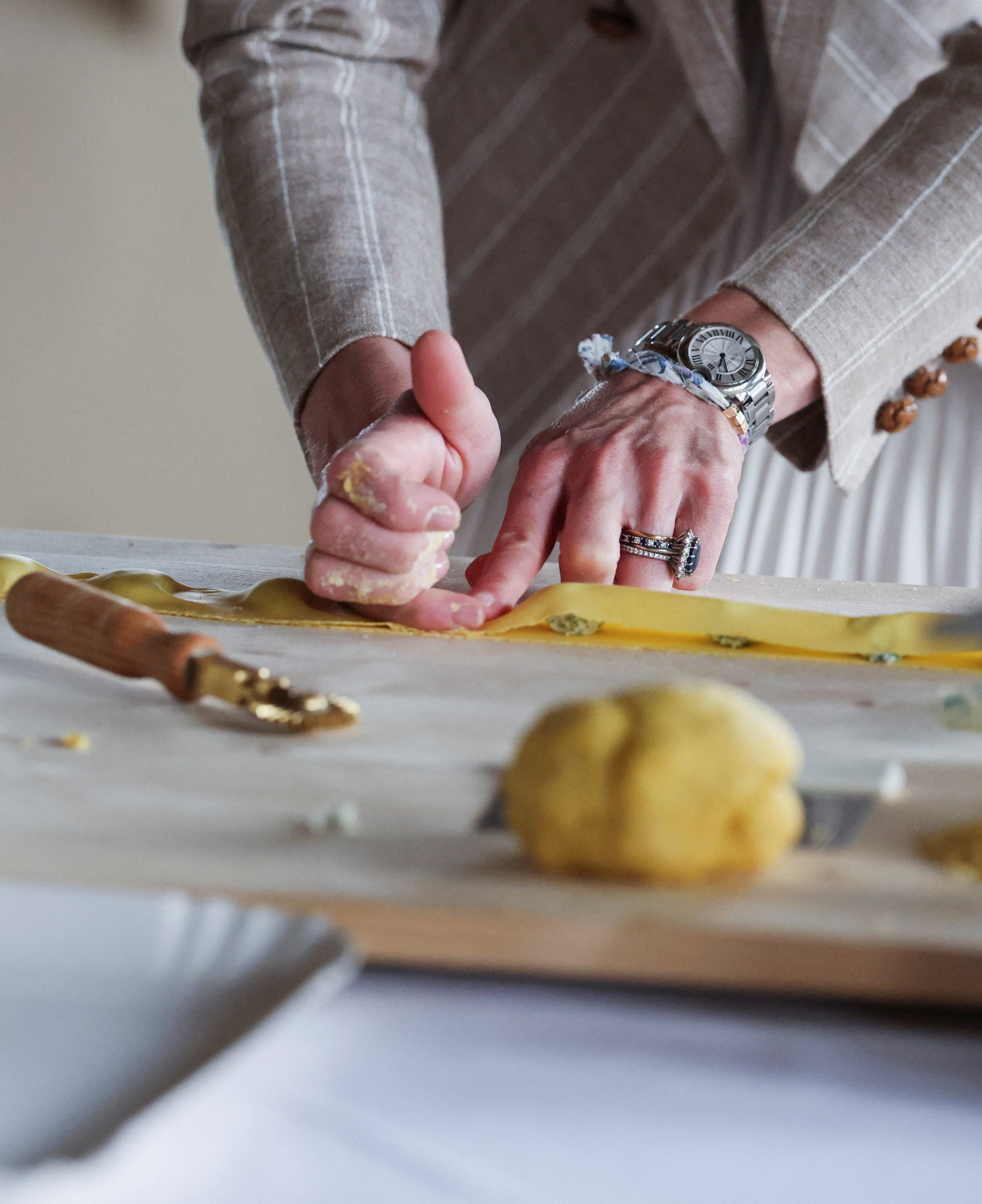 A close-up of Catherine, Princess of Wales, helping to prepare lunch at rural Agriturismo Al Vigneto as she concludes a two-day visit to the region on May 14, 2026, in Felino, Italy. | Source: Getty Images