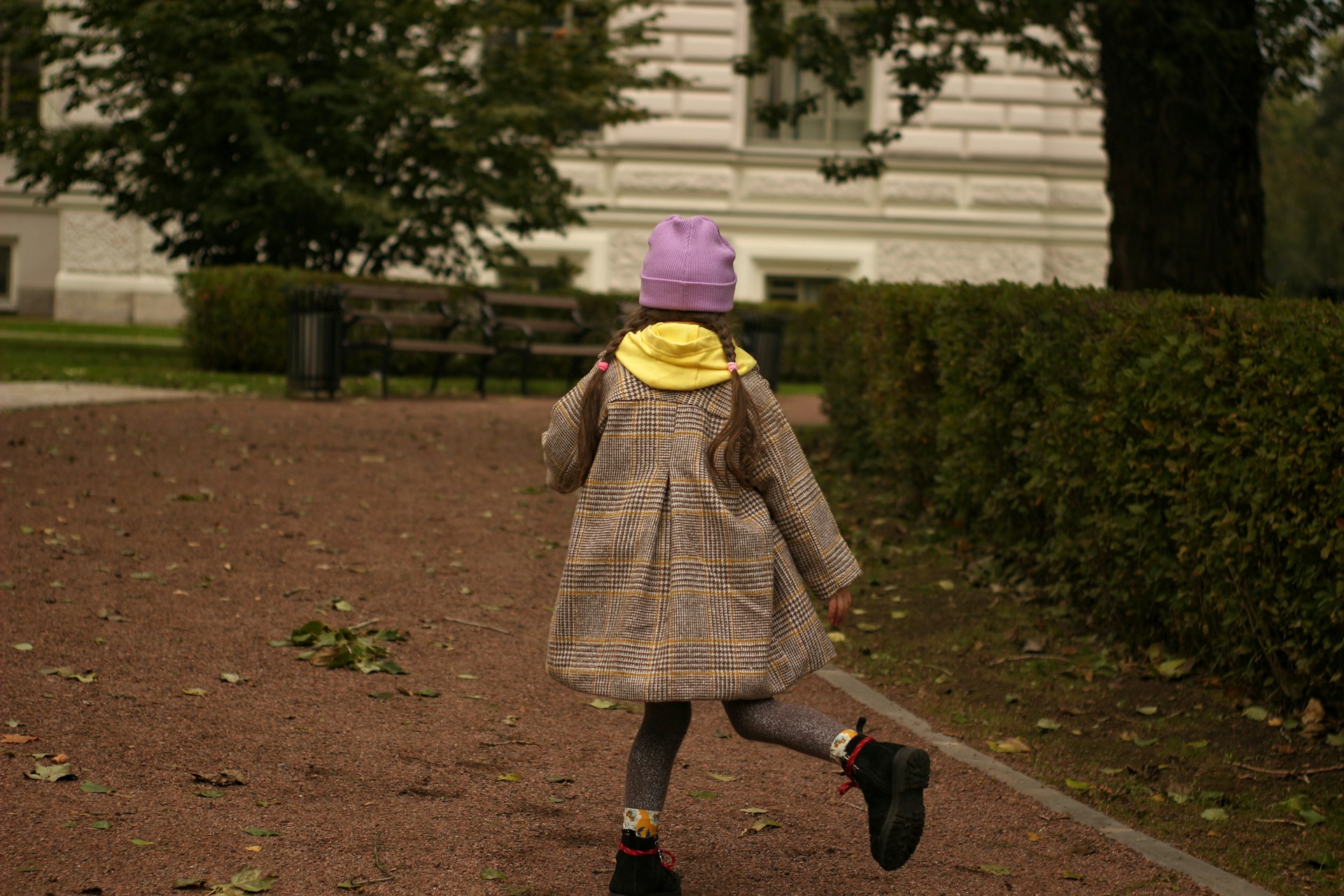 My Daughter Told Me Not to Visit Her Family Again — Days Later, She Was at My Door Begging 5 A little girl outside a building | Source: Unsplash