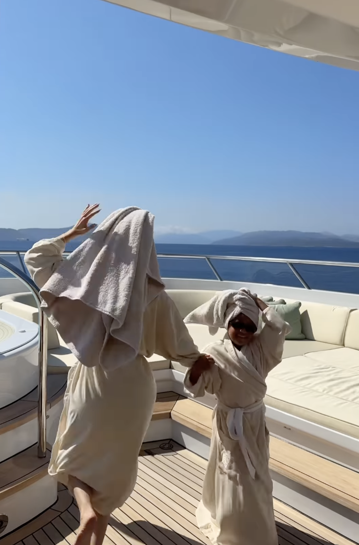 Kylie Jenner and her daughter Stormi dancing together on a yacht, posted on July 13, 2025 | Source: Instagram/kyliejenner