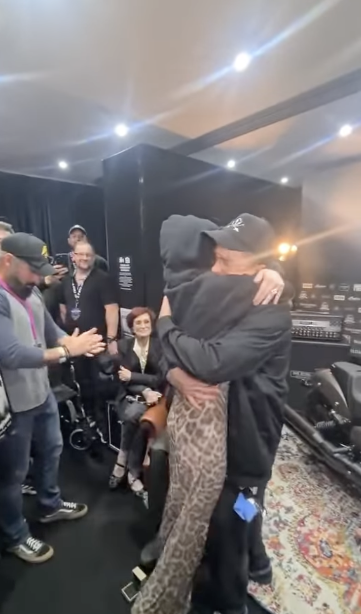 Kelly Osbourne and Sid Wilson share an embrace after the proposal on July 5, 2025 | Source: Instagram/kellyosbourne