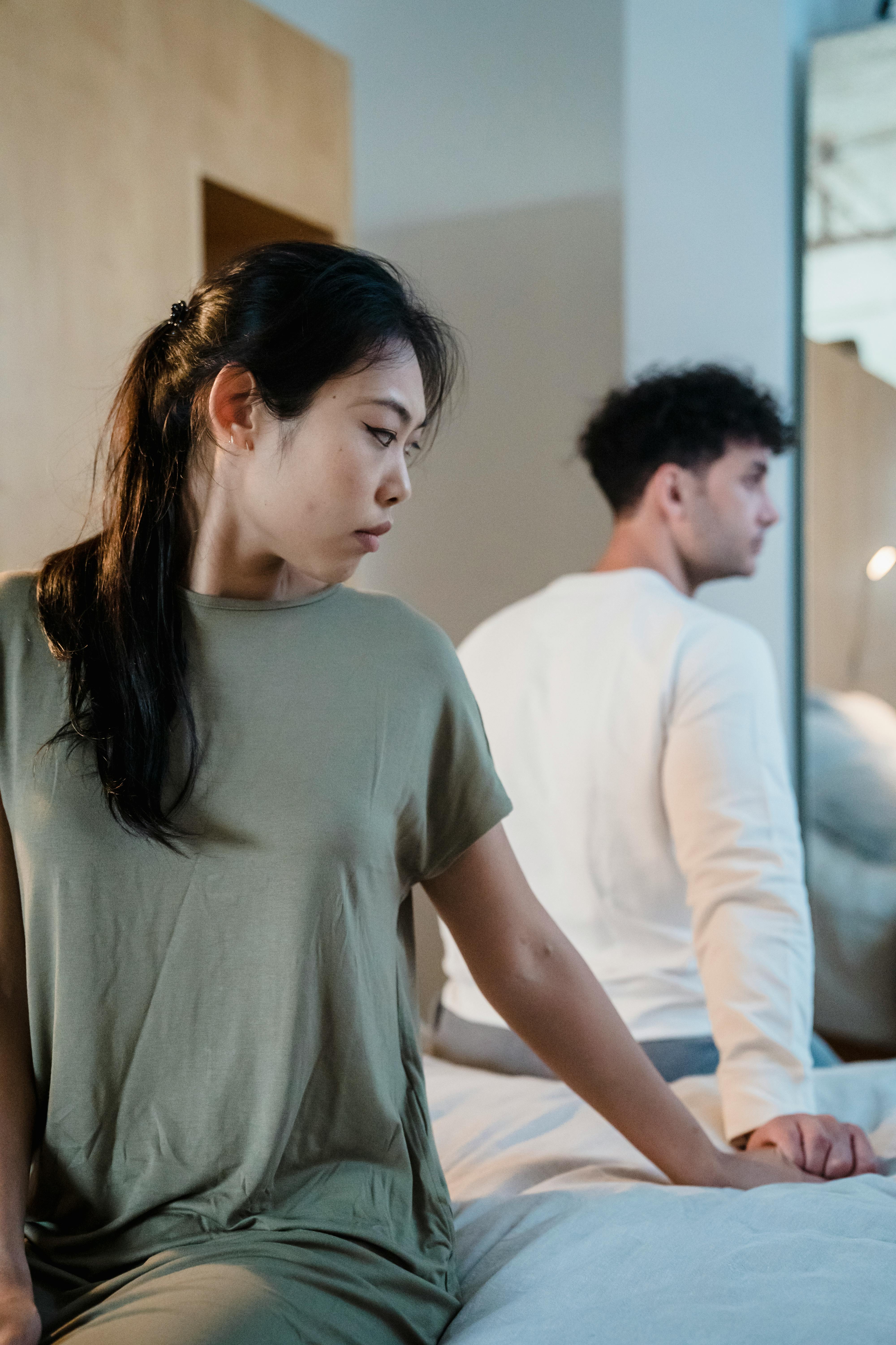 Troubled couple in the bedroom | Source: Pexels