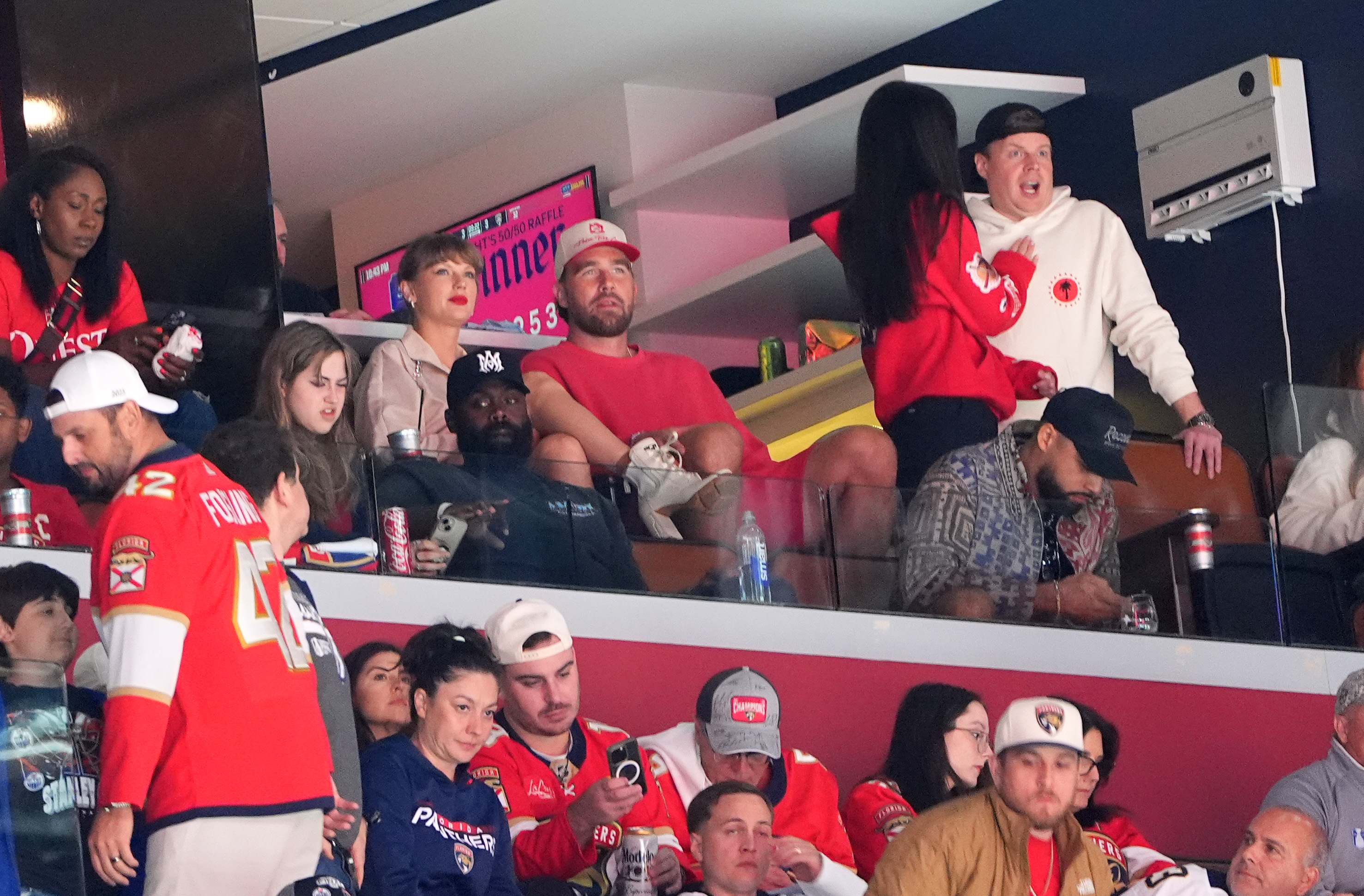 Travis Kelsey and Taylor Swift watch game 4 of the Stanley Cup Final between the Florida Panthers and the Edmonton Oilers in Game Four of the 2025 Stanley Cup Final at the Amerant Bank Arena on June 12, 2025, in Sunrise, Florida. | Source: Getty Images