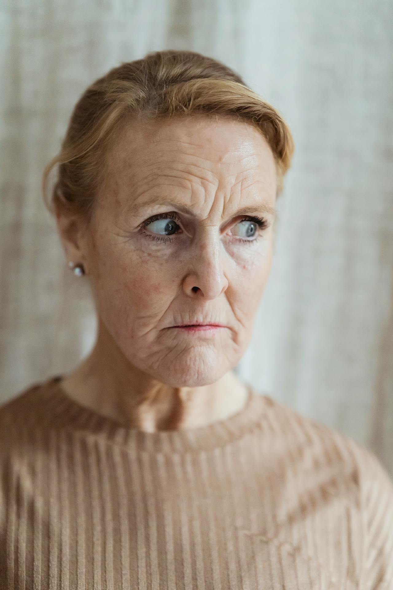 My Daughter Told Me Not to Visit Her Family Again — Days Later, She Was at My Door Begging 12 An angry older woman | Source: Pexels