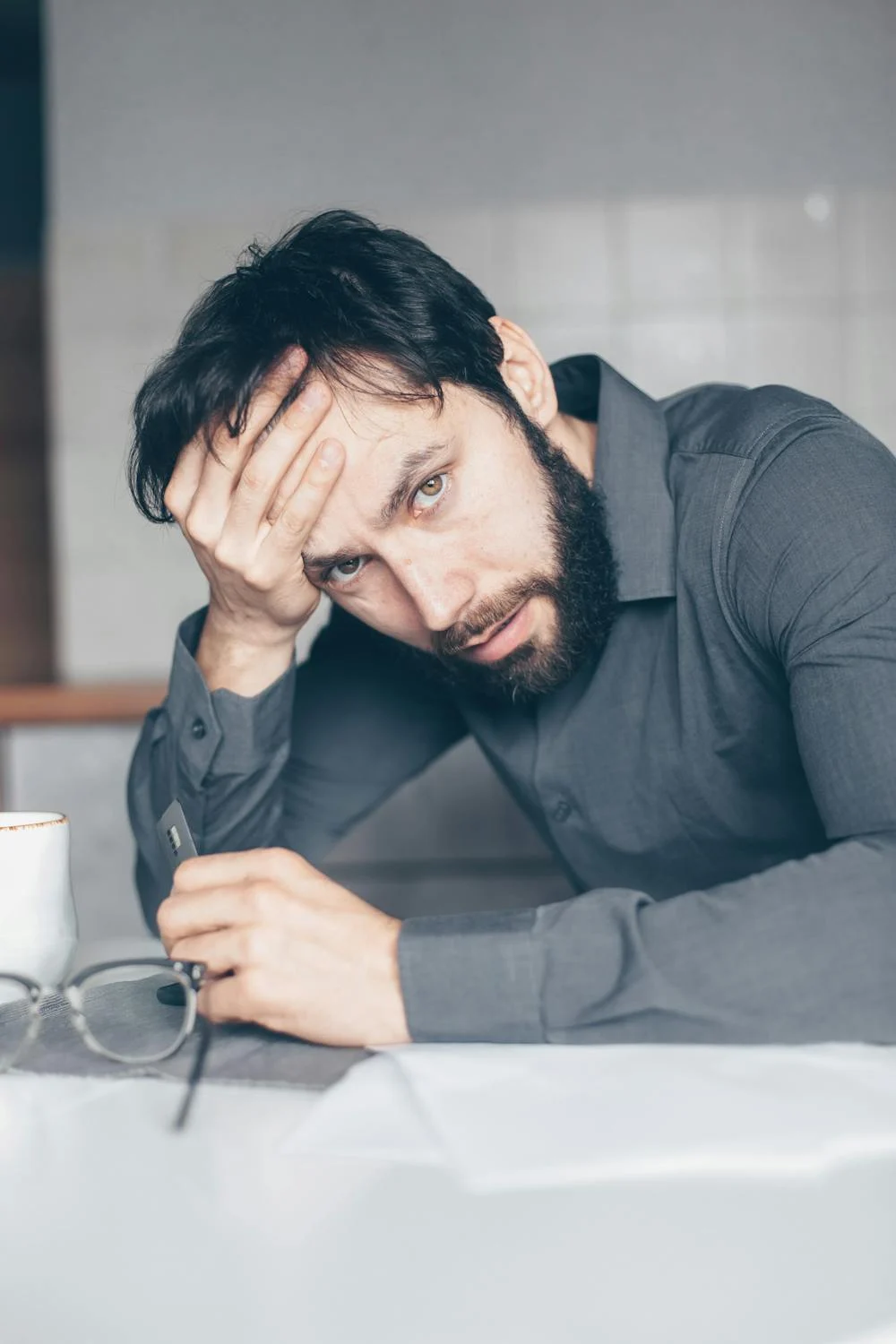 A nervous man looking into the camera | Source: Pexels