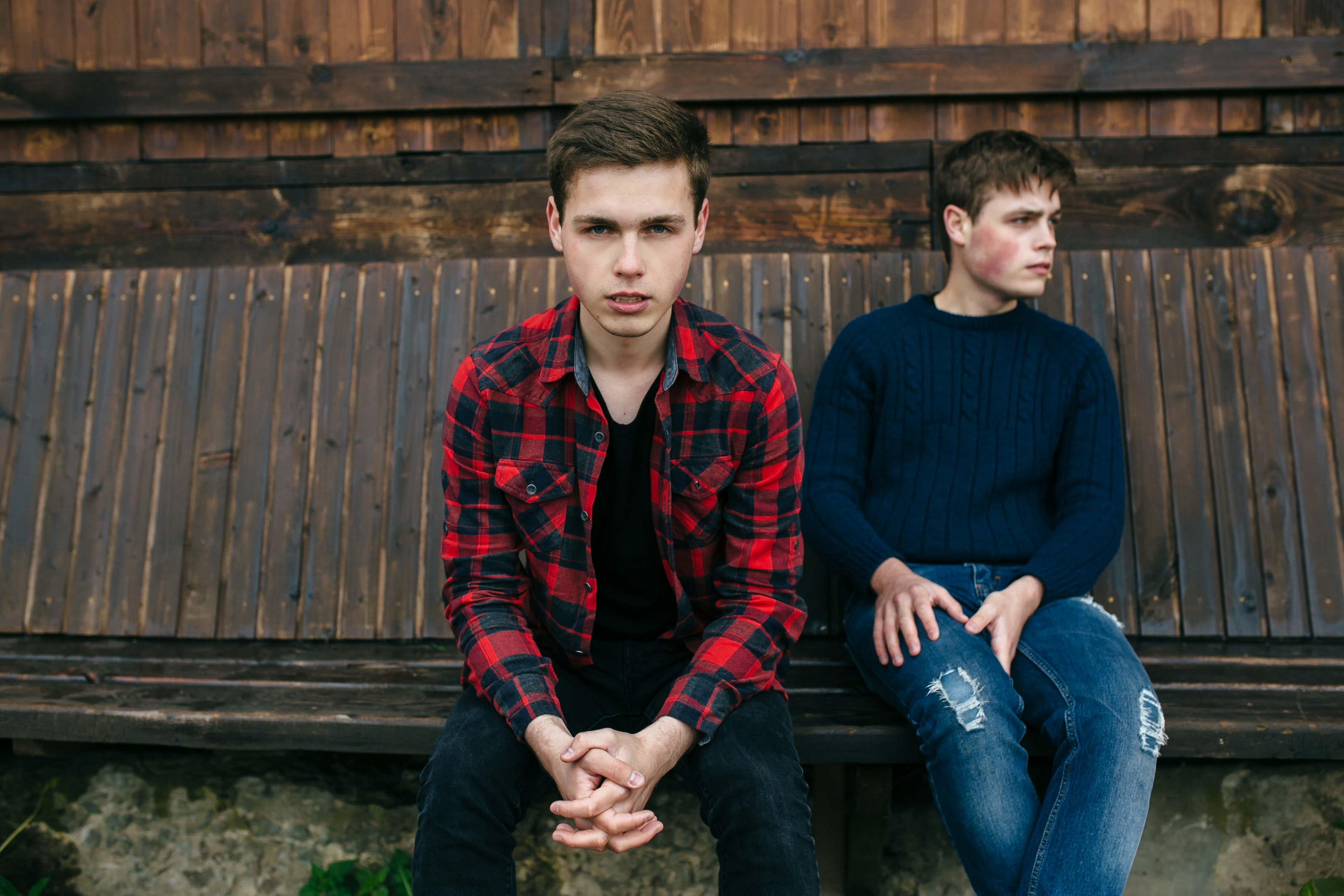 Two serious teenage boys | Source: Freepik