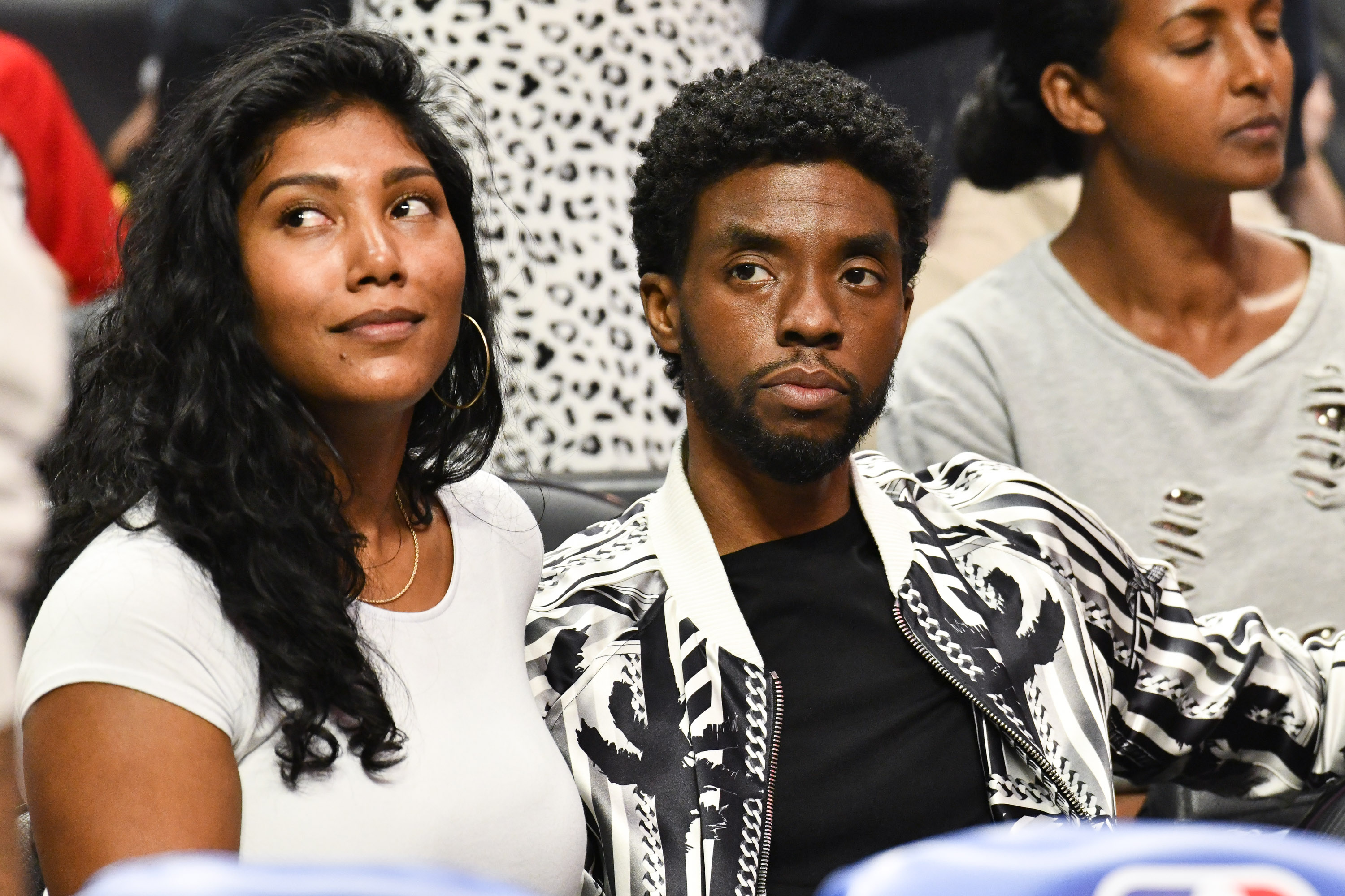 Taylor Simone Ledward and Chadwick Boseman attend a basketball game between the Los Angeles Clippers and the Los Angeles Lakers at Staples Center on October 22, 2019 in Los Angeles, California. | Source: Getty Images