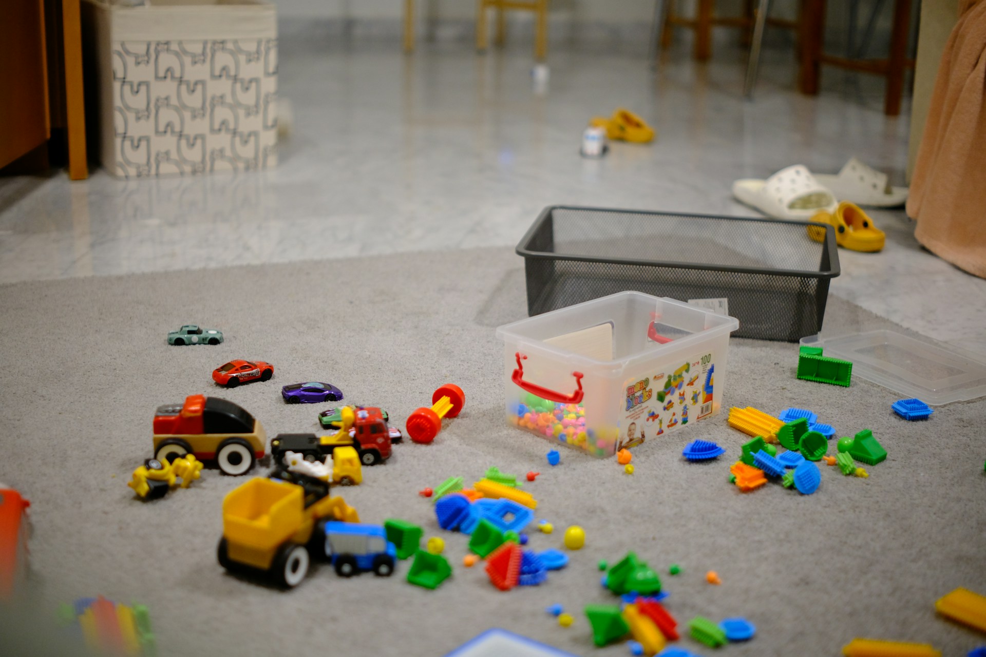 Toys scattered on the floor | Source: Unsplash