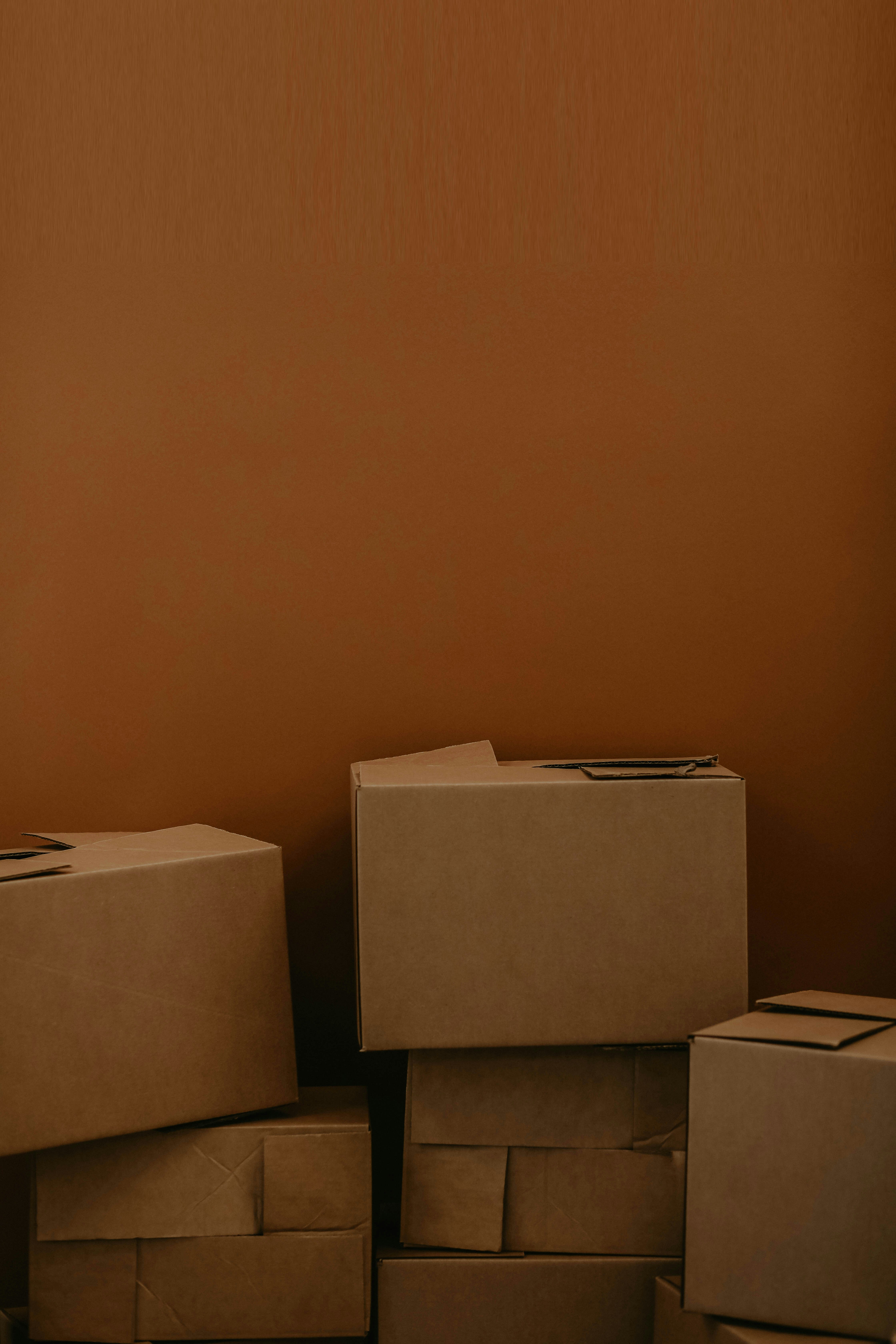 Stacked cardboard boxes | Source: Unsplash