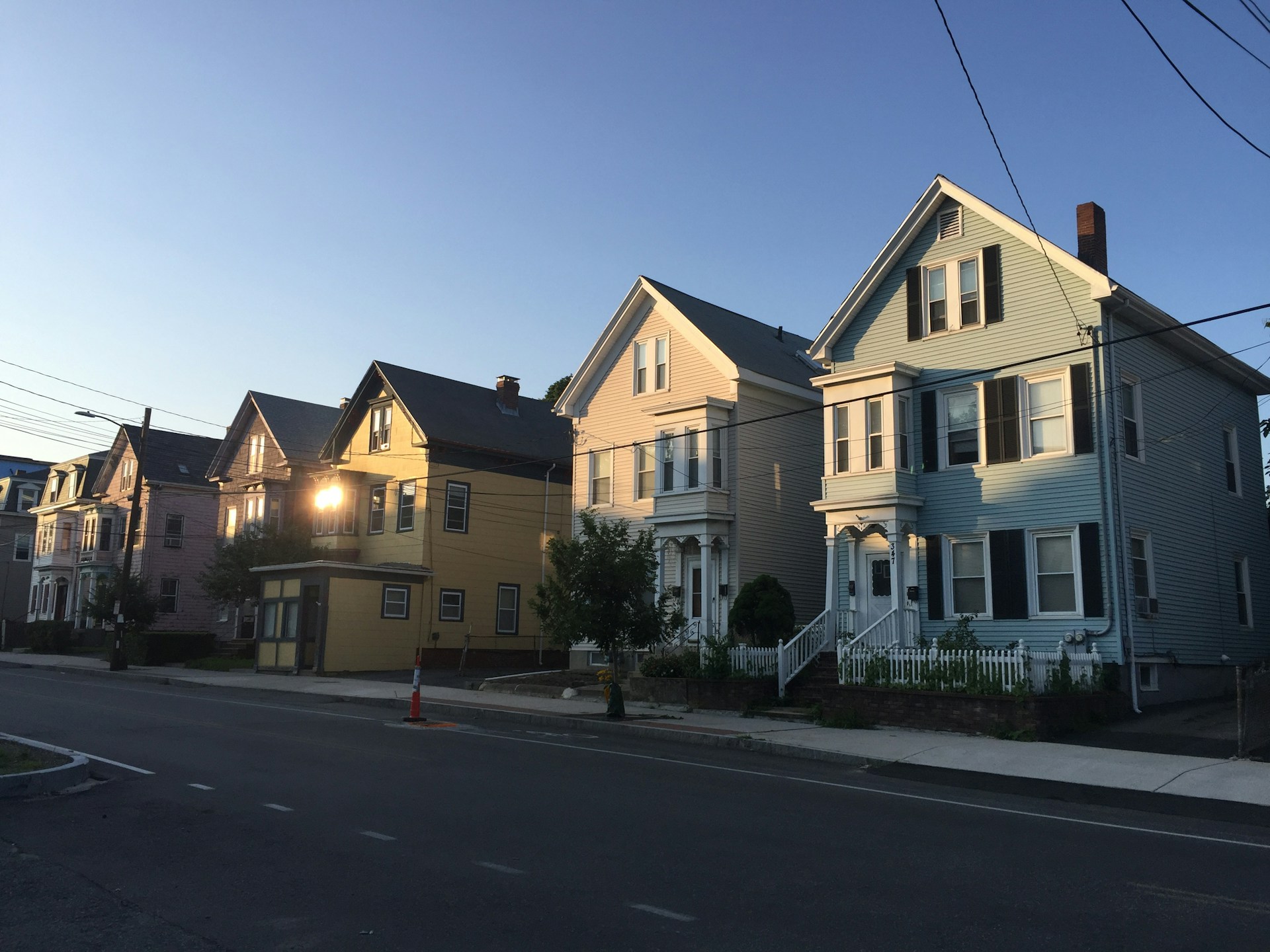 My Daughter Told Me Not to Visit Her Family Again — Days Later, She Was at My Door Begging 3 Posh houses lining a street | Source: Unsplash
