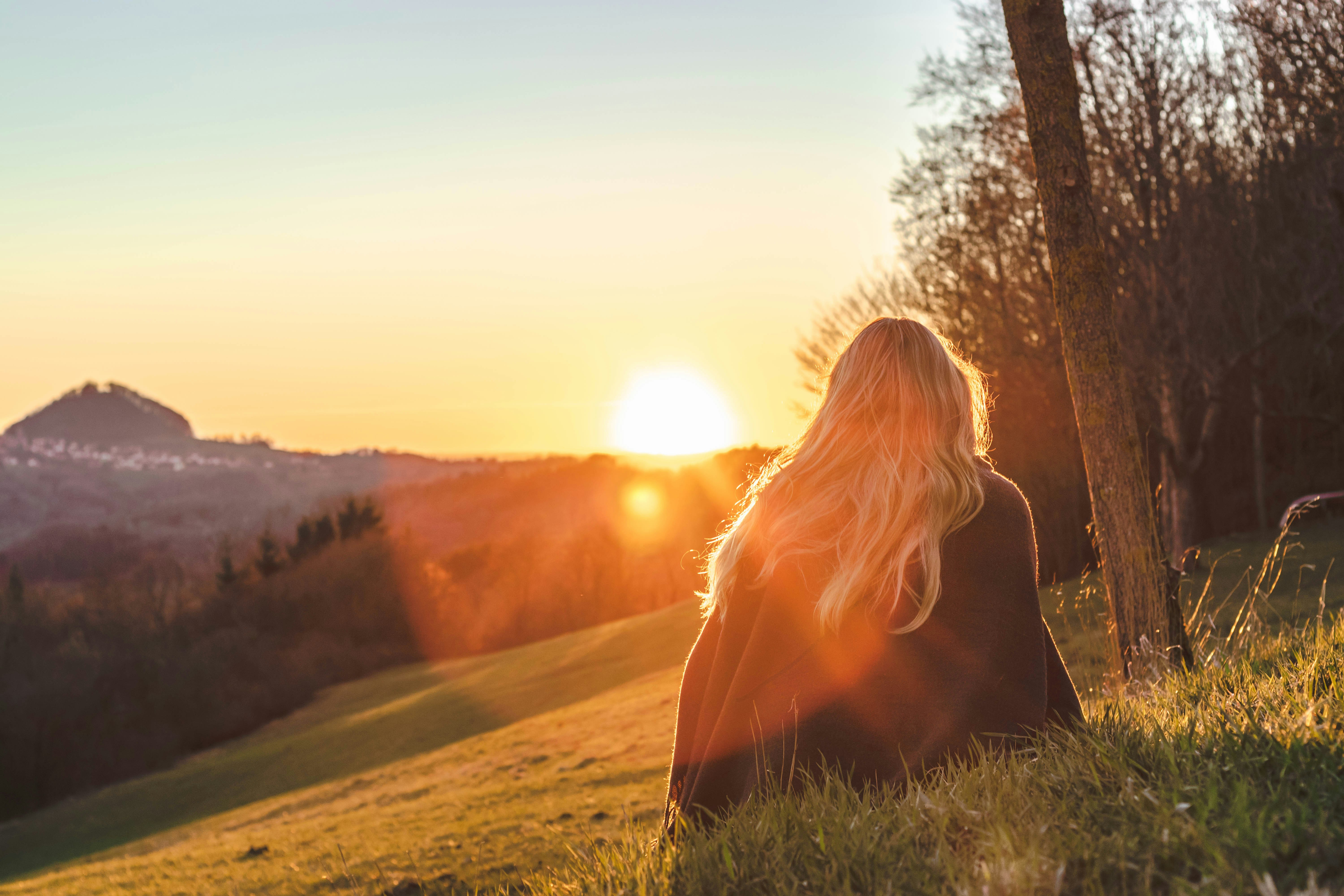 A woman sitting outside | Source: Unsplash