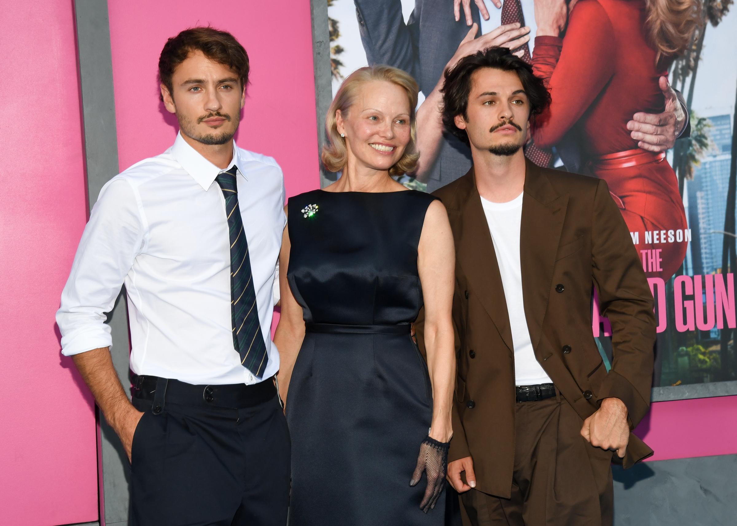 Brandon Thomas Lee, Pamela Anderson, Dylan Jagger Lee at "The Naked Gun" New York Premiere on July 28, 2025 in New York City. | Source: Getty Images