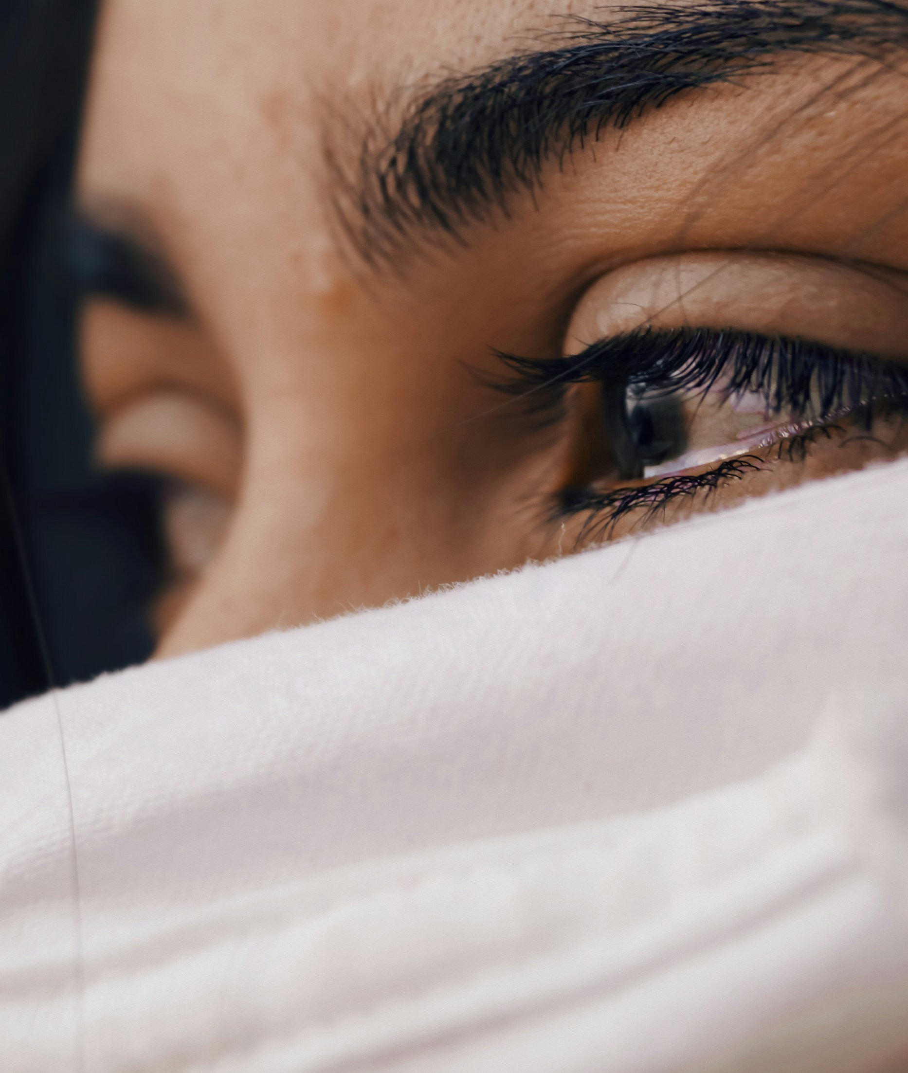 An emotional woman in tears | Source: Unsplash