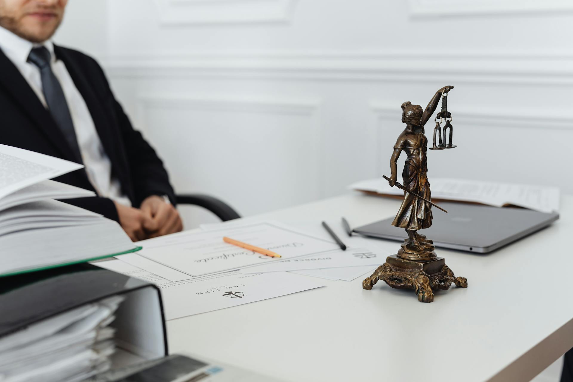 A lawyer seated in his office | Source: Pexels