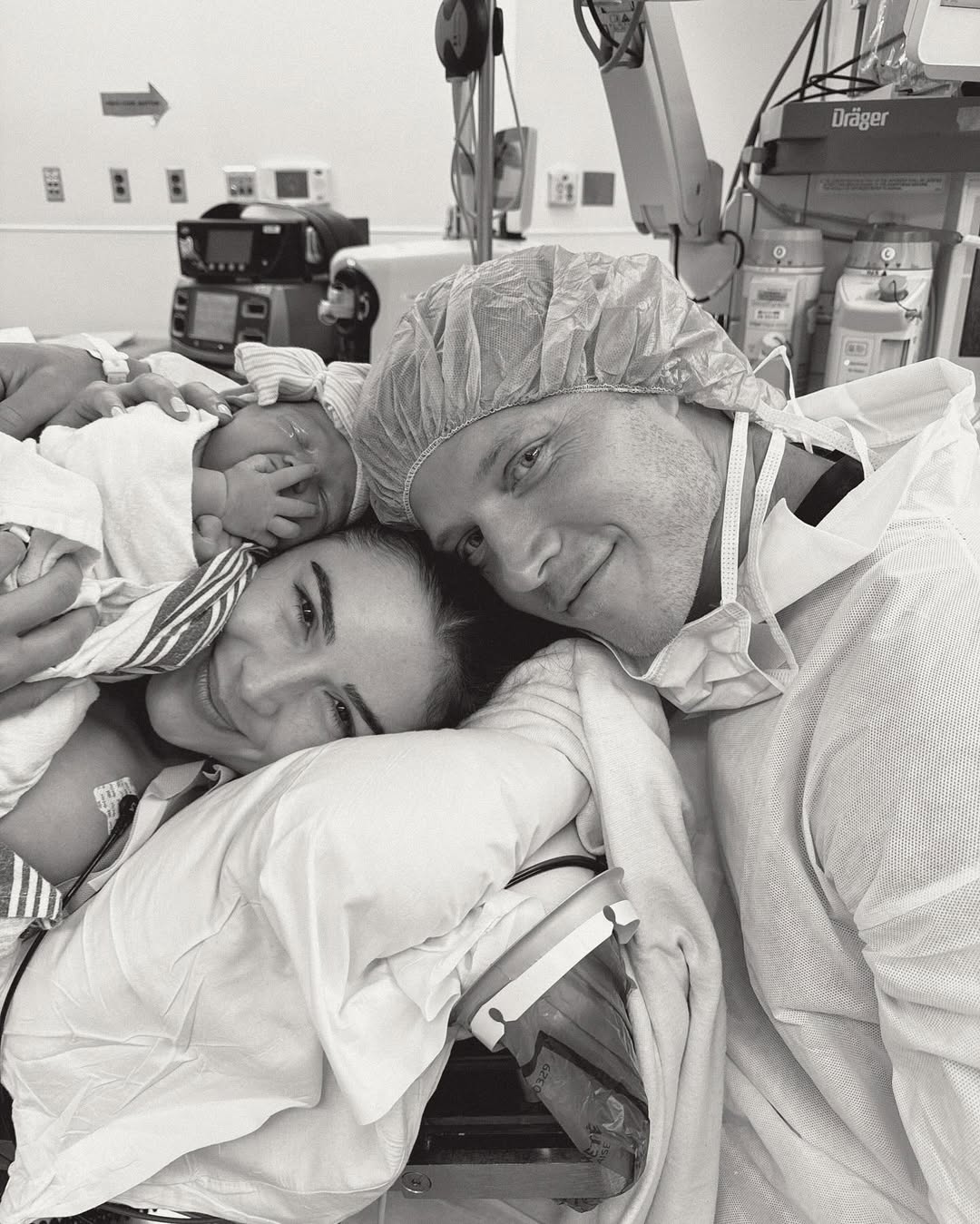 Olivia Culpo with her husband, Christian McCaffrey, and newborn daughter in a post shared on July 13, 2025. | Source: Instagram/oliviaculpo