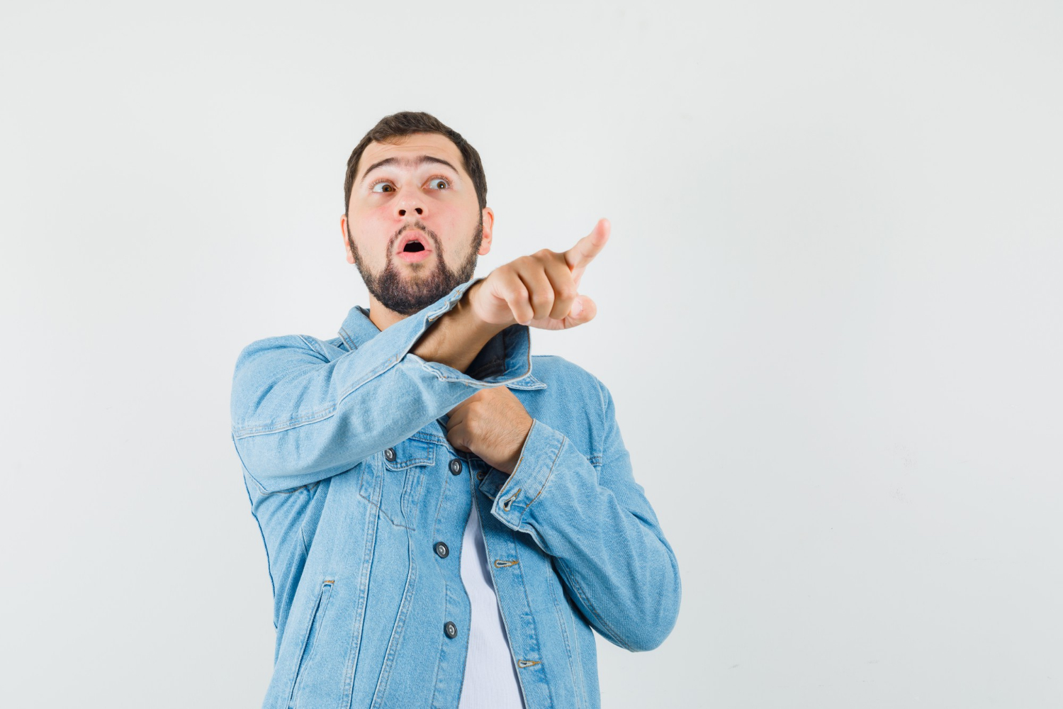 A stunned man pointing his finger | Source: Freepik