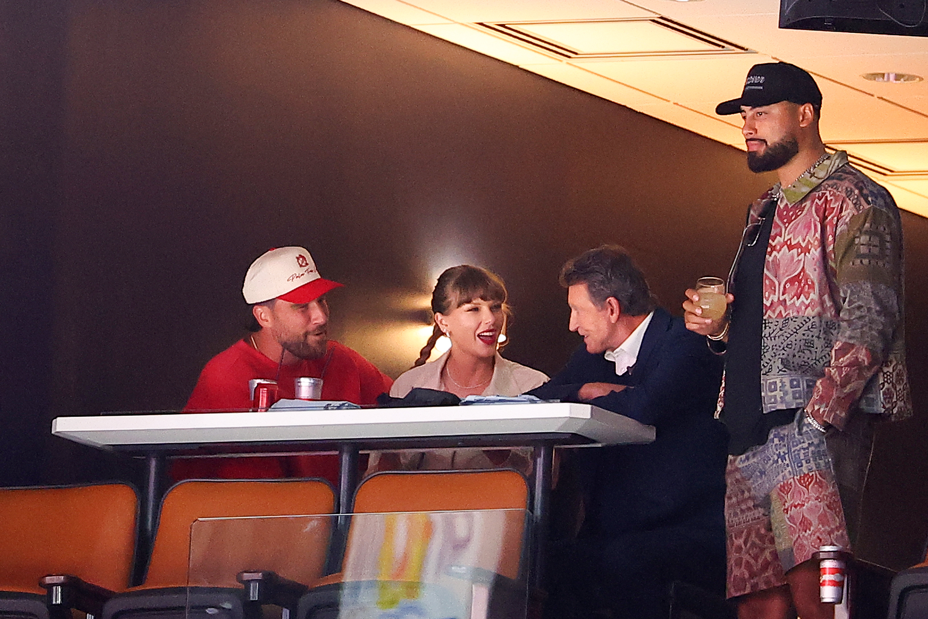 (L-R) Travis Kelce, Taylor Swift, Wayne Gretzky and Aric Jones, sit together during the second period as the Edmonton Oilers and the Florida Panthers play in Game Four of the 2025 Stanley Cup Final at Amerant Bank Arena on June 12, 2025, in Sunrise, Florida. | Source: Getty Images